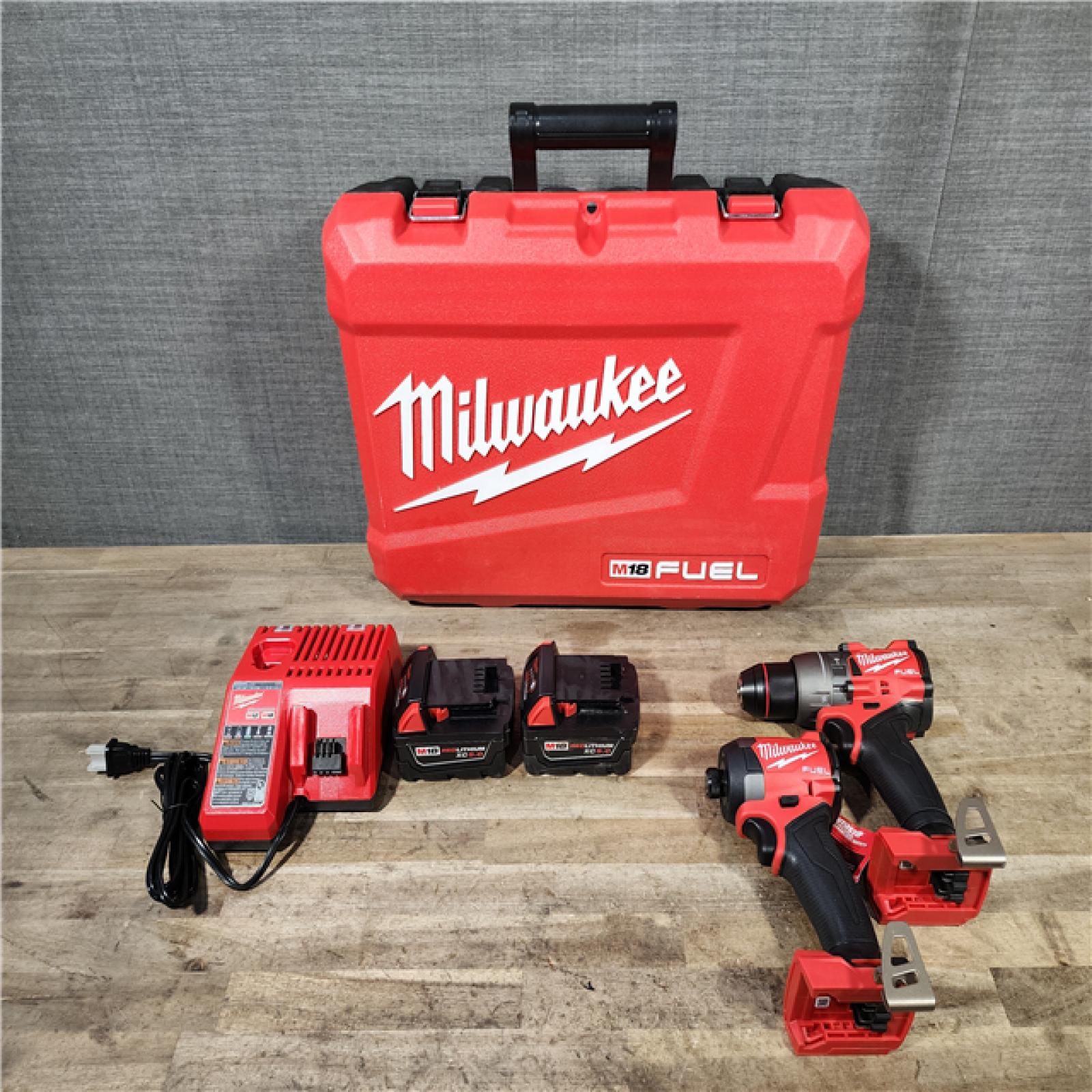 HOUSTON LOCATION - AS-IS MILWAUKEE FUEL 18V Lithium-Ion Brushless Cordless Hammer Drill and Impact Driver Combo Kit