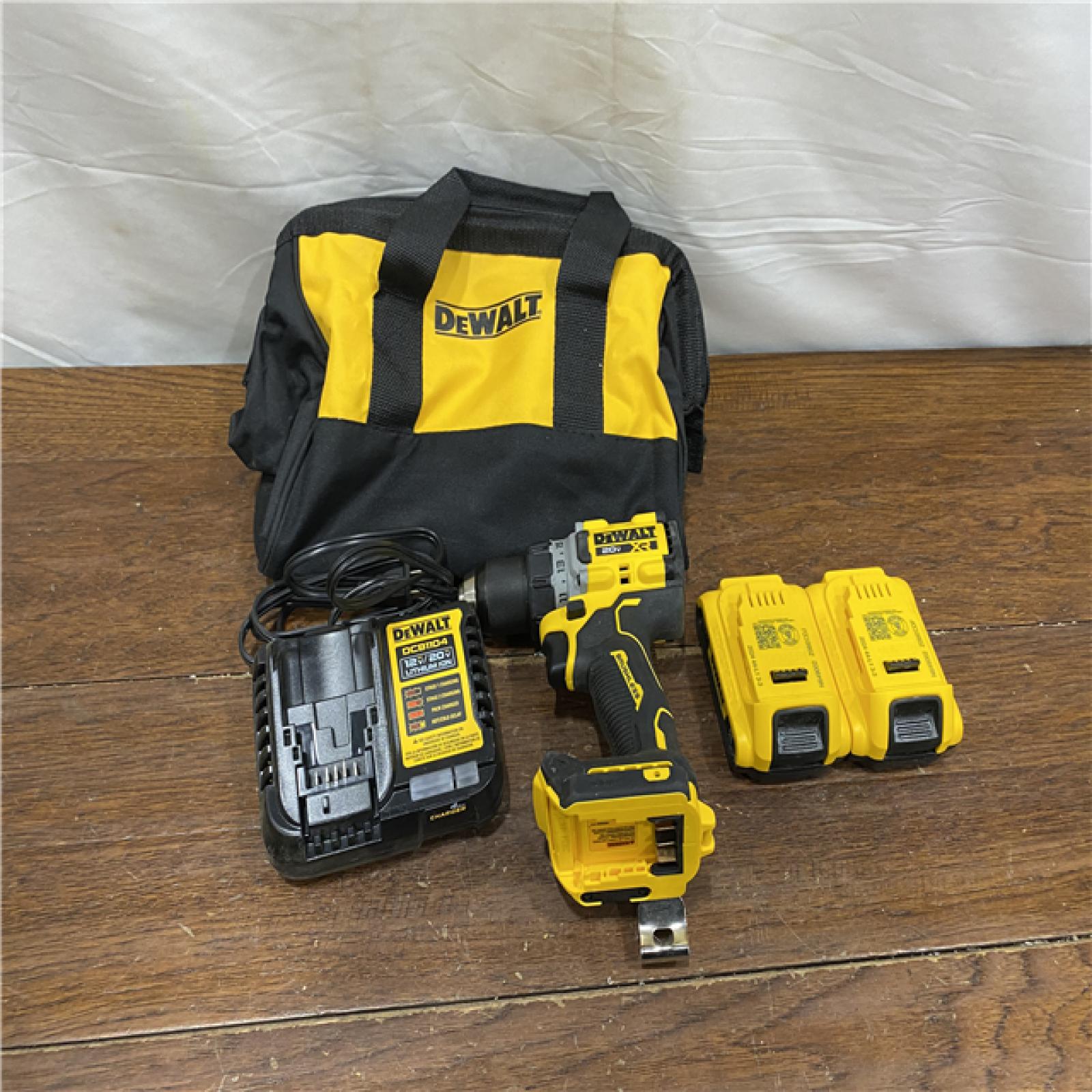 AS-IS DEWALT 20V MAX XR Cordless Drill/Driver, ATOMIC Impact Driver 2 Tool Combo Kit, (2) 2.0Ah Batteries, Charger, and Bag