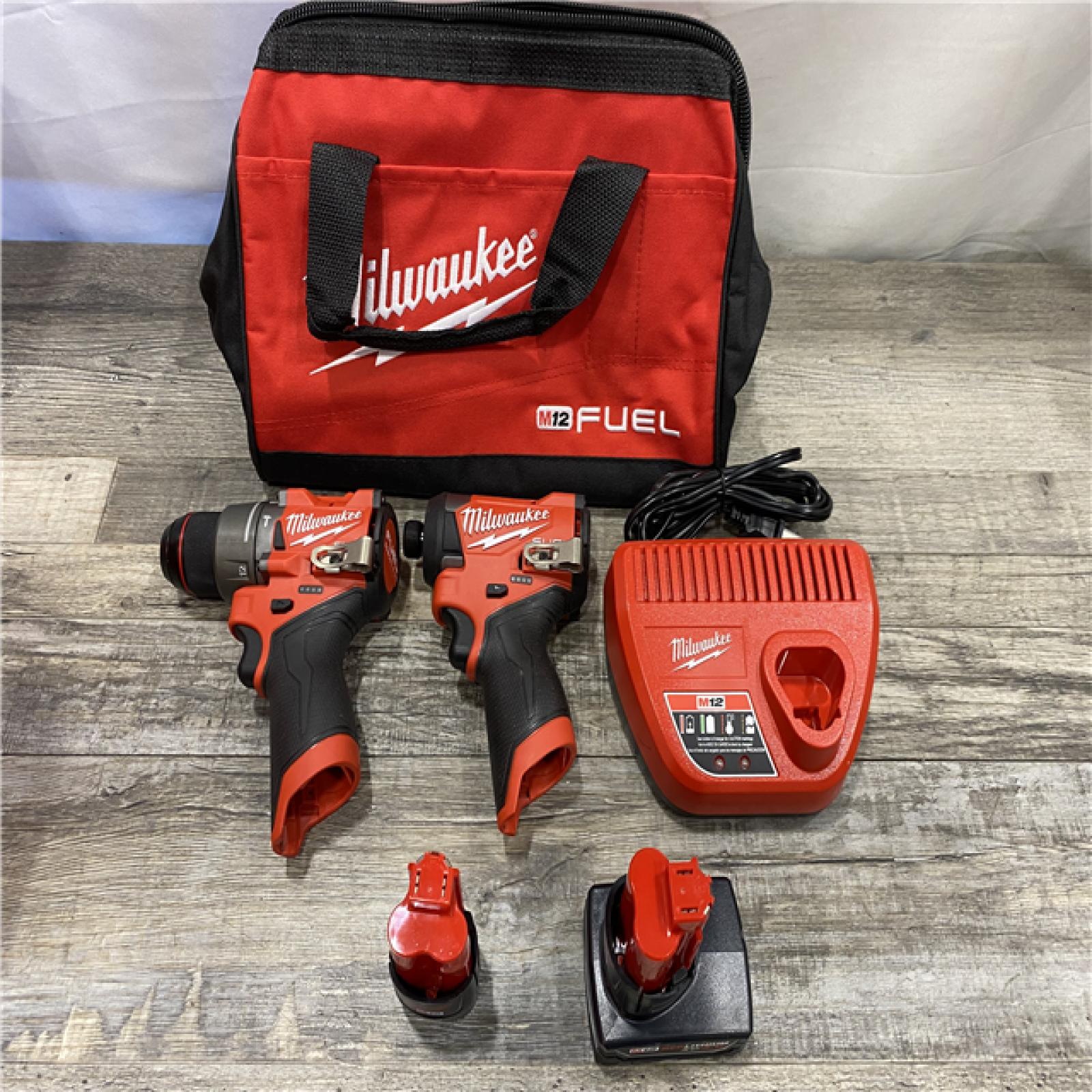 AS-IS Milwaukee FUEL 12-Volt Lithium-Ion Brushless Cordless Hammer Drill and Impact Driver Combo Kit