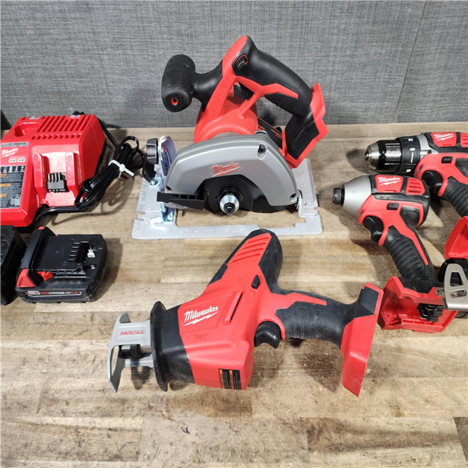 HOUSTON LOCATION - AS-IS M18 18V Lithium-Ion Cordless Combo Kit (5-Tool) with (1) 3.0Ah and (1) 1.5Ah Battery  (1) Charger  (1) Tool Bag