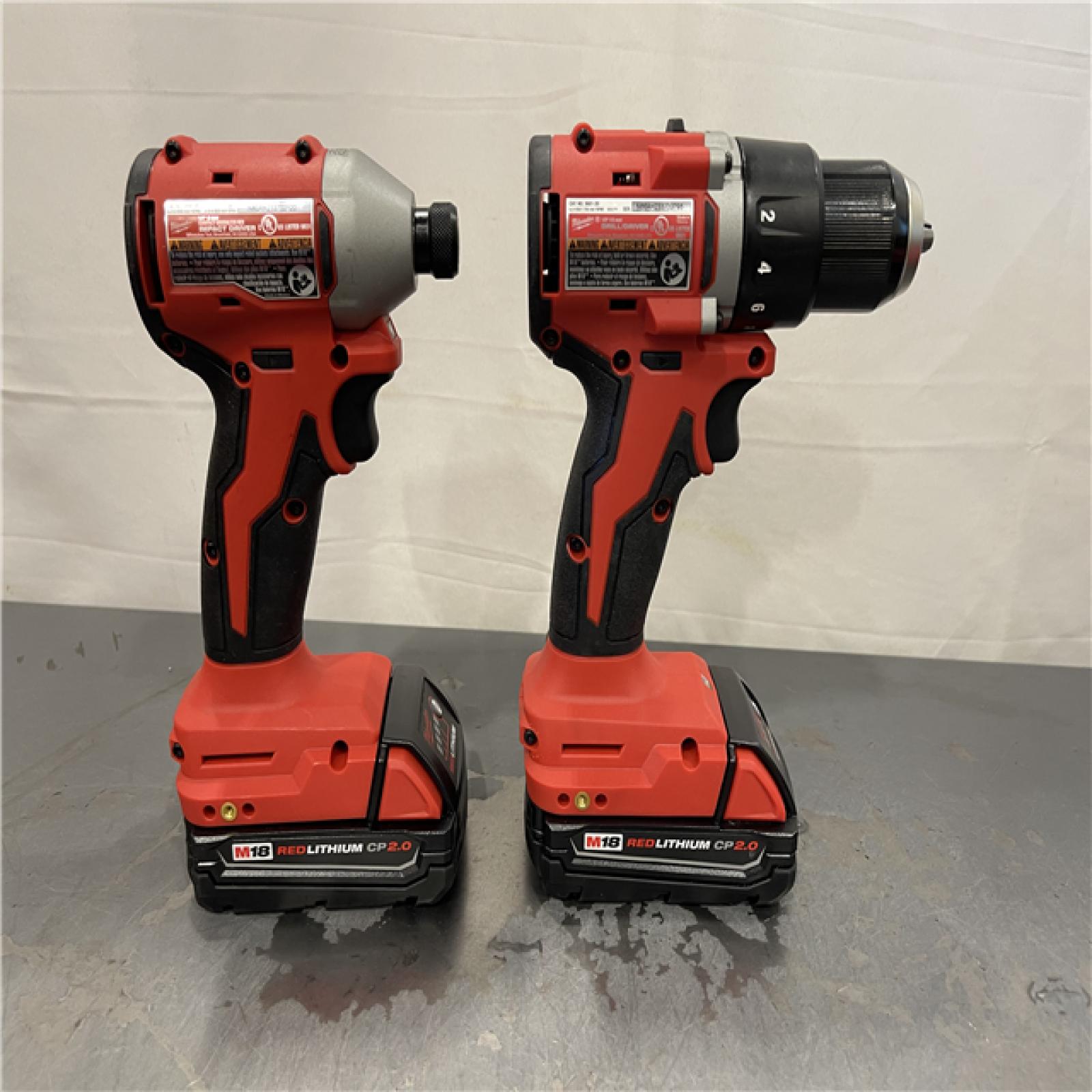 AS-IS - Milwaukee M18 18V Lithium-Ion Brushless Cordless Compact Drill/Impact Combo Kit