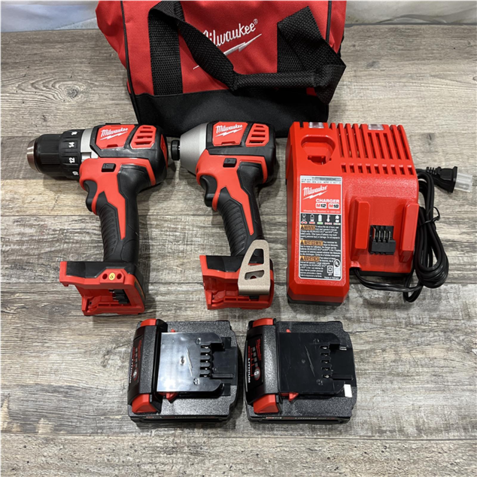 AS-IS Milwaukee 18V Lithium-Ion Cordless Drill Driver/Impact Driver Combo Kit