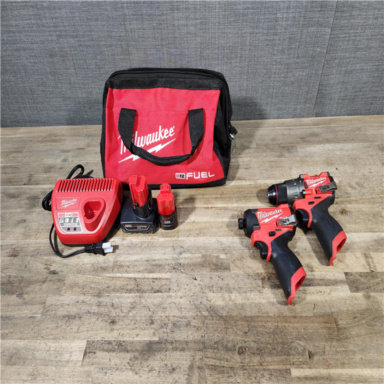 HOUSTON LOCATION - AS-IS (APPEARS LIKE NEW) Milwaukee M12 FUEL Cordless 2-Tool Combo Kit: 1/2Hammer Drill  1/4Hex Impact Driver 3497-22