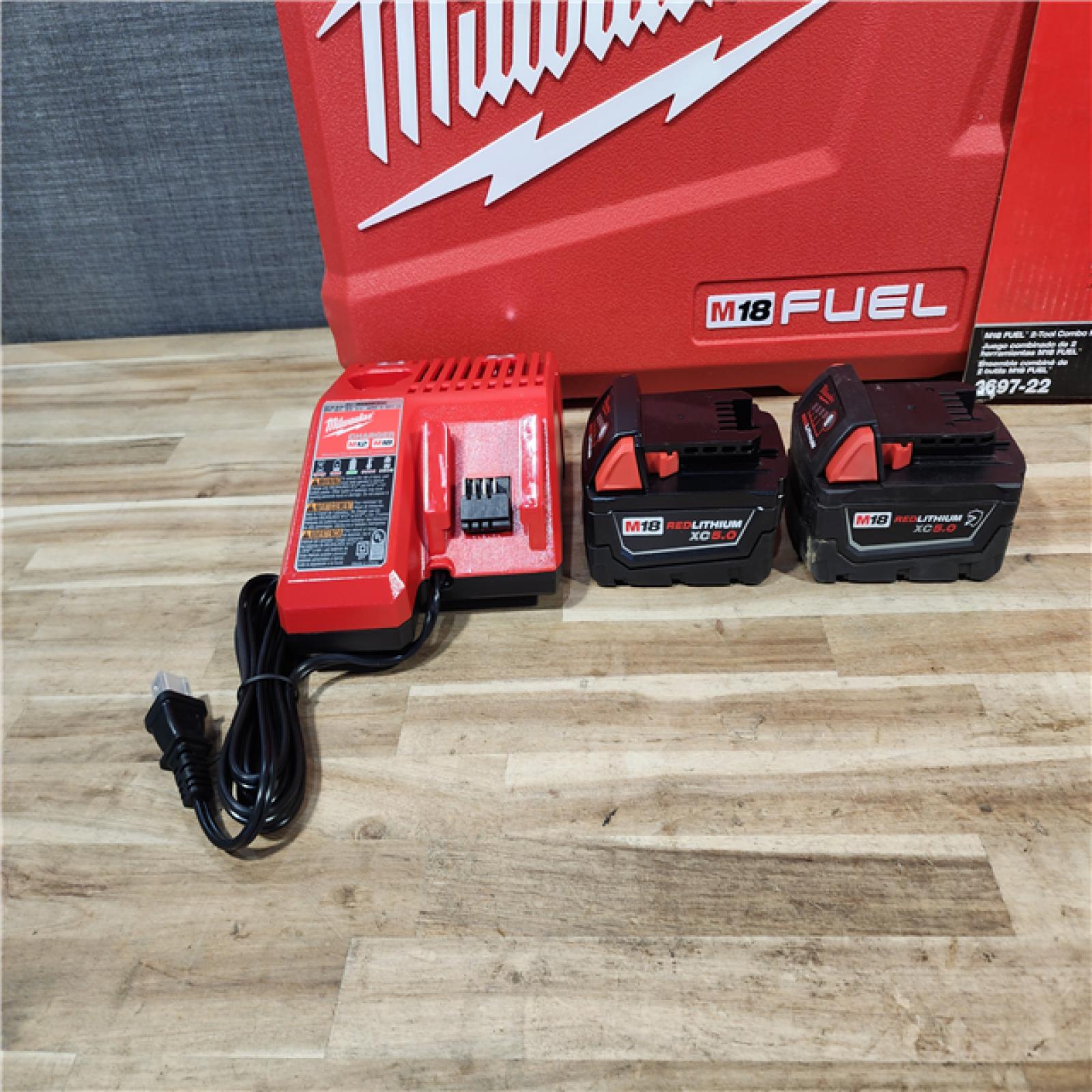 HOUSTON LOCATION - AS-IS Milwaukee  FUEL 18V Lithium-Ion Brushless Cordless Hammer Drill and Impact Driver Combo Kit