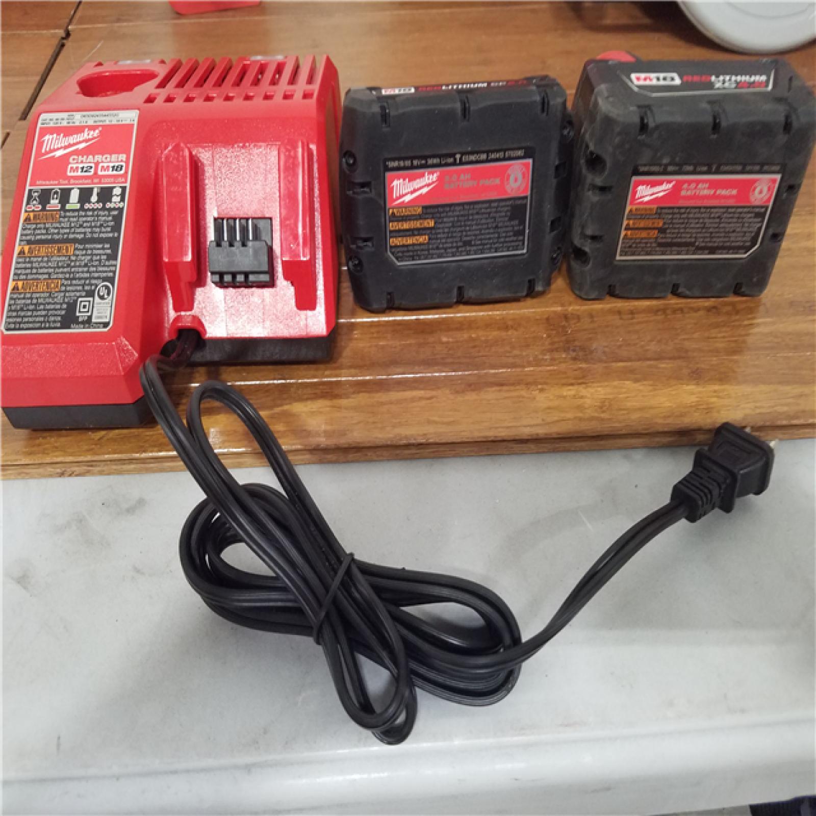 California AS-IS Milwaukee M18 4-Tool Combo Kit  Includes (2) Batteries  Charger and Bag; Appears in Like New Condition