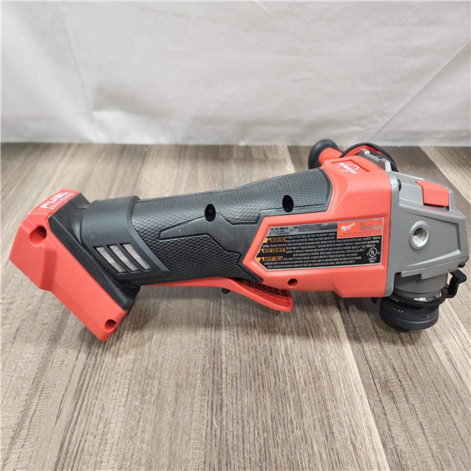 AS-IS- Milwaukee FUEL 18-Volt Lithium-Ion Brushless Cordless 4-1/2 in./5 in. Grinder W/Paddle Switch (Tool-Only)