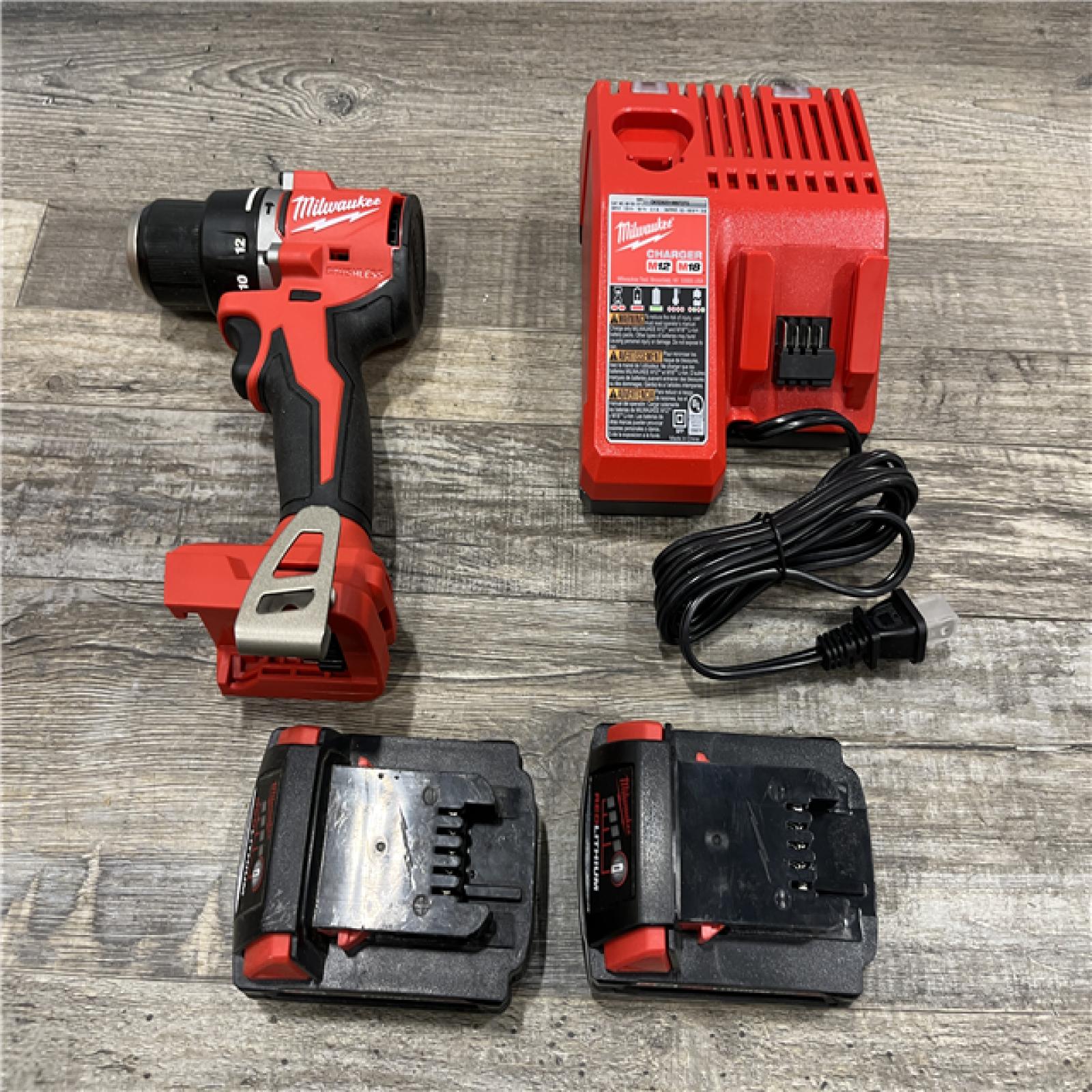AS-IS Milwaukee 18V Lithium-Ion Brushless Cordless 1/2 in. Compact Hammer Drill/Driver Kit