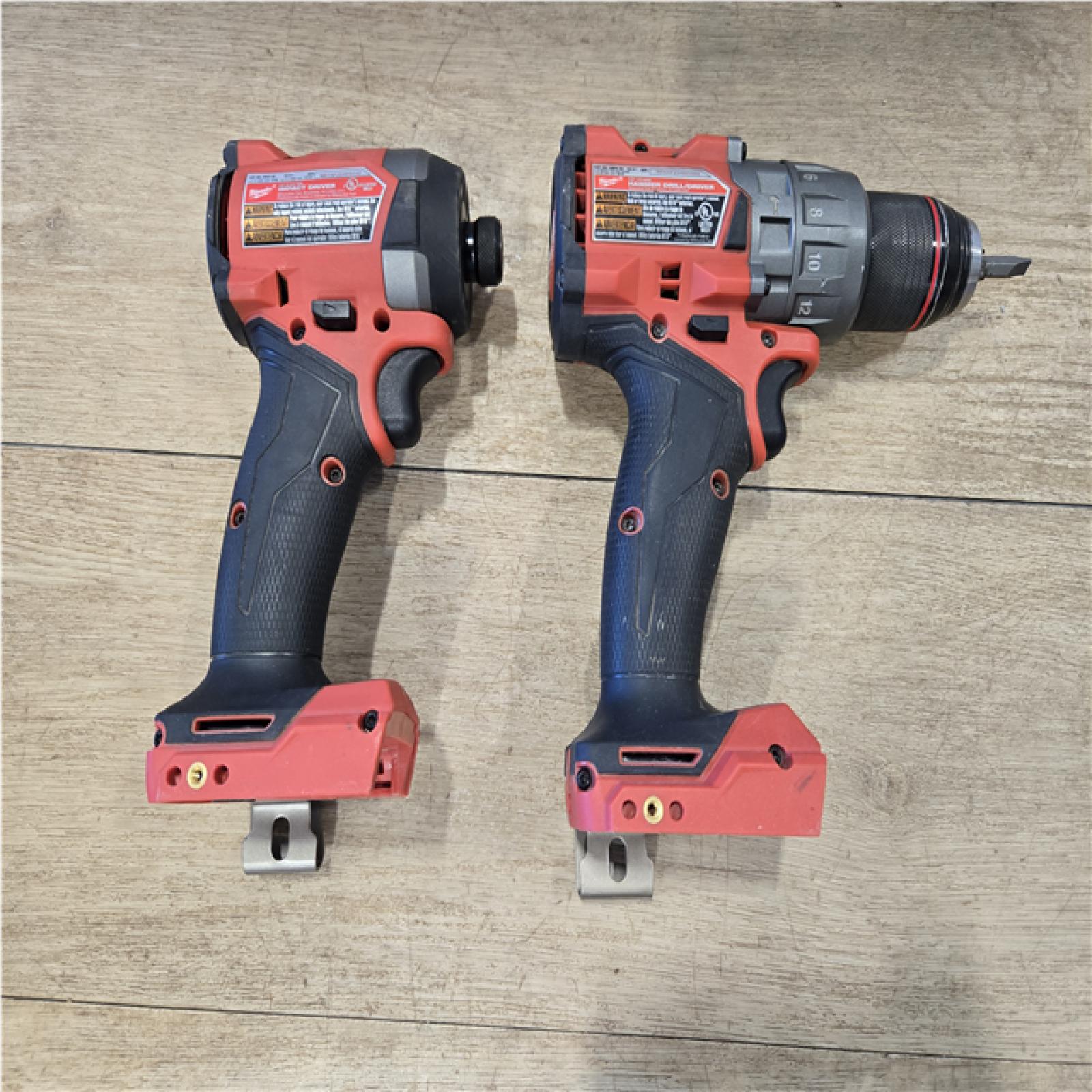 AS-IS Milwaukee FUEL 18V Lithium-Ion Brushless Cordless Hammer Drill and Impact Driver Combo Kit