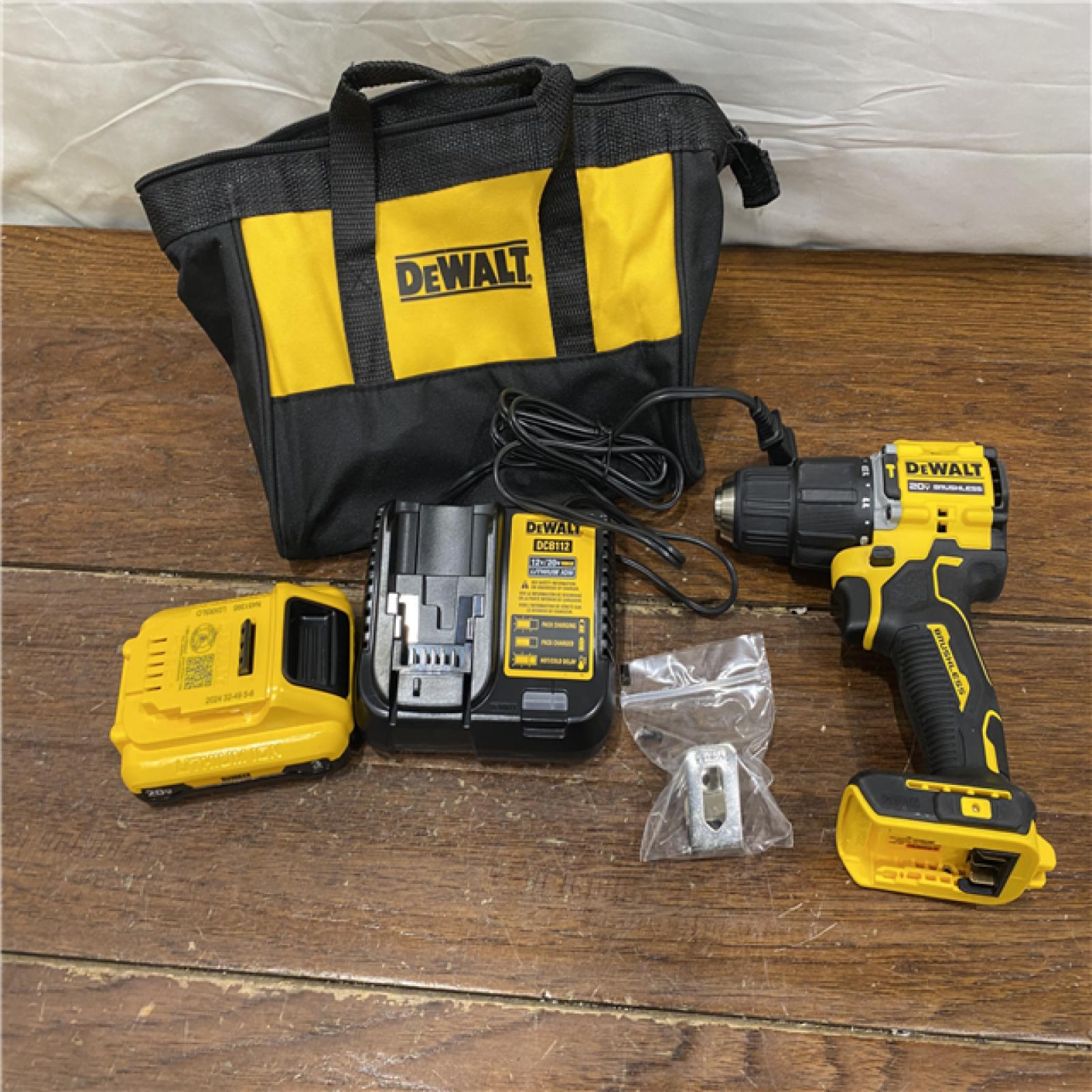 AS-IS DEWALT ATOMIC 20-Volt Lithium-Ion Cordless 1/2 in. Compact Hammer Drill with 3.0Ah Battery, Charger and Bag