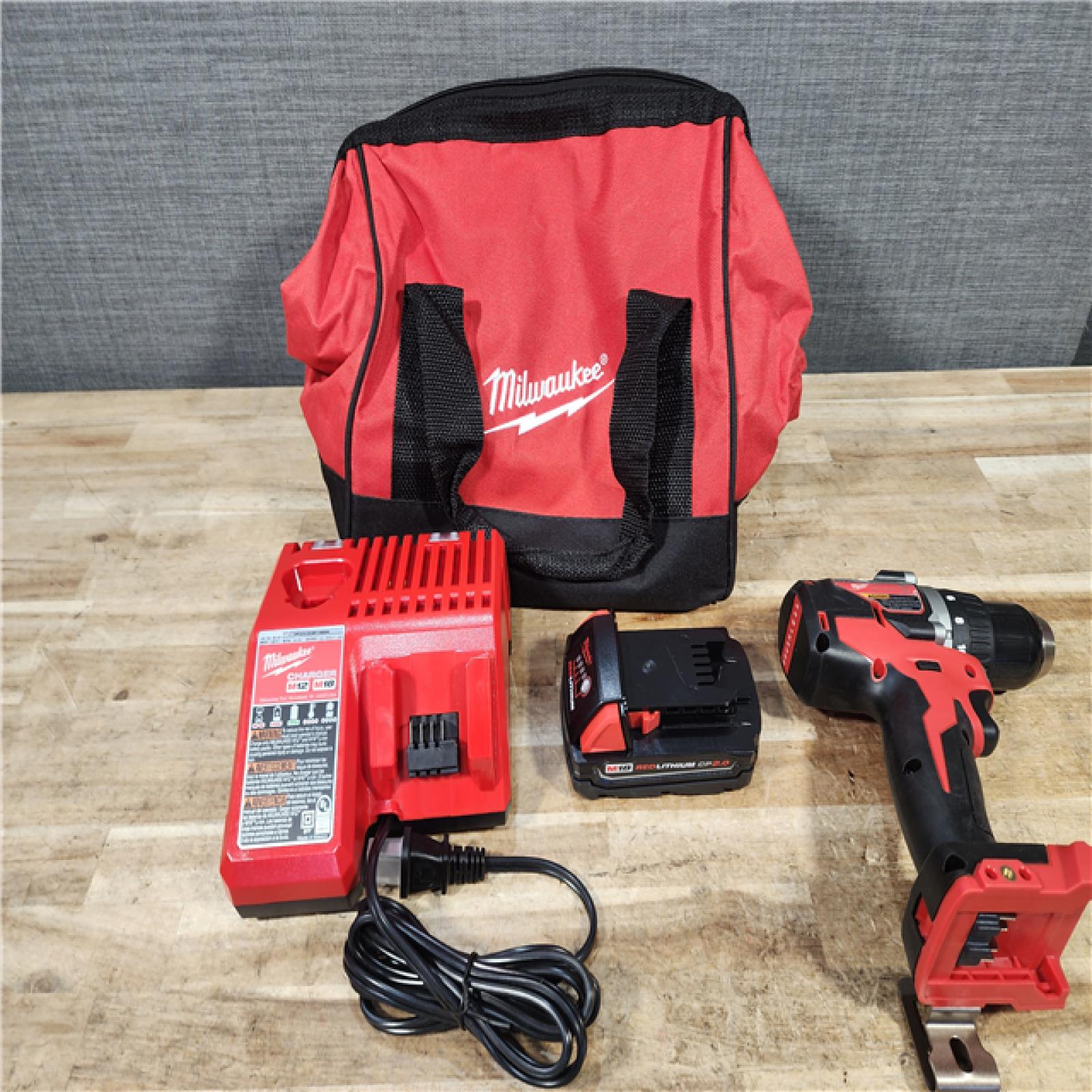 HOUSTON LOCATION - AS - IS Milwaukee 18V Lithium-Ion Brushless Cordless 1/2 in. Compact Drill/Driver with kit