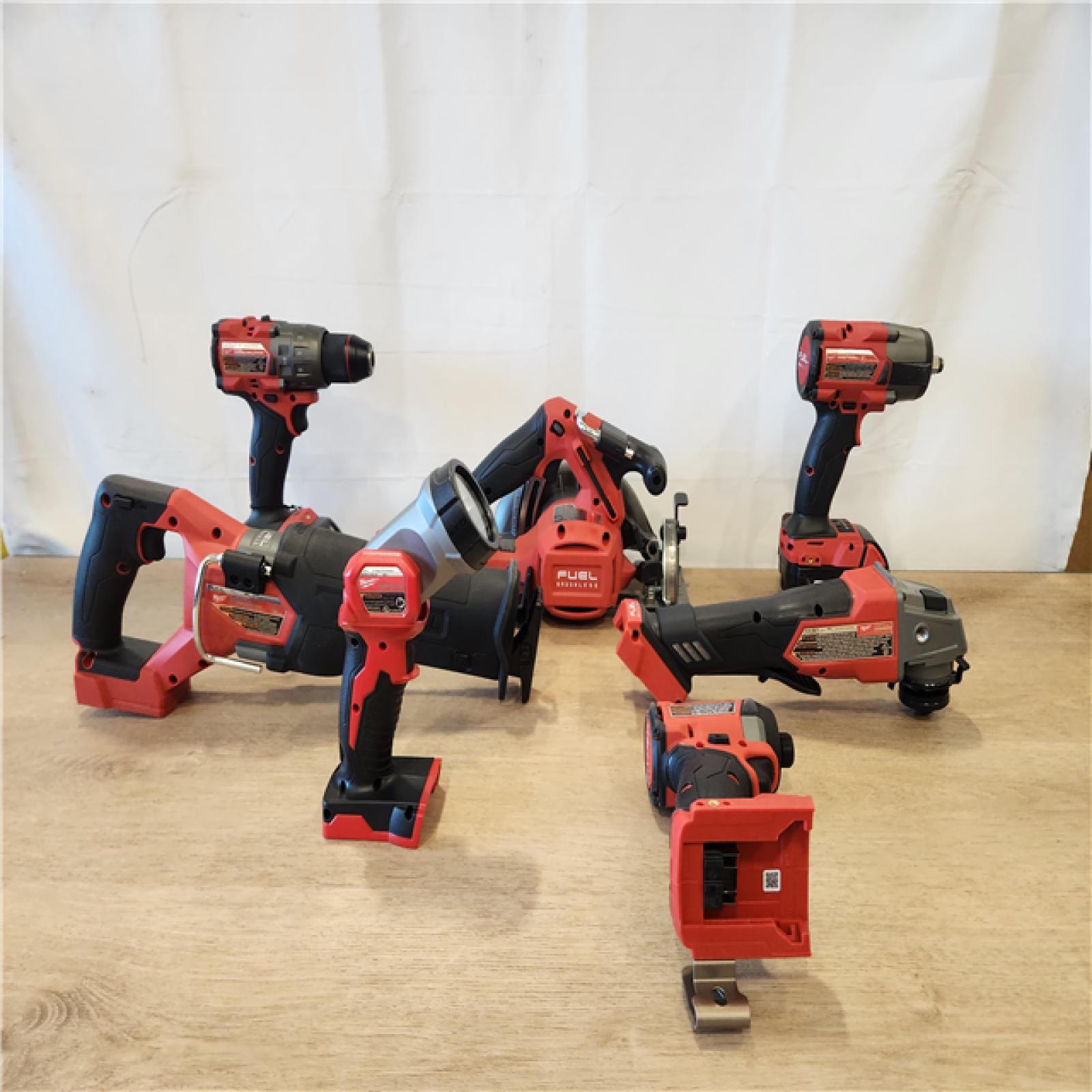 AS-IS- Milwaukee M18 FUEL 18V Lithium-Ion Brushless Cordless Combo Kit with Two 5.0 Ah Batteries  1 Charger  2 Tool Bags (7-Tool)
