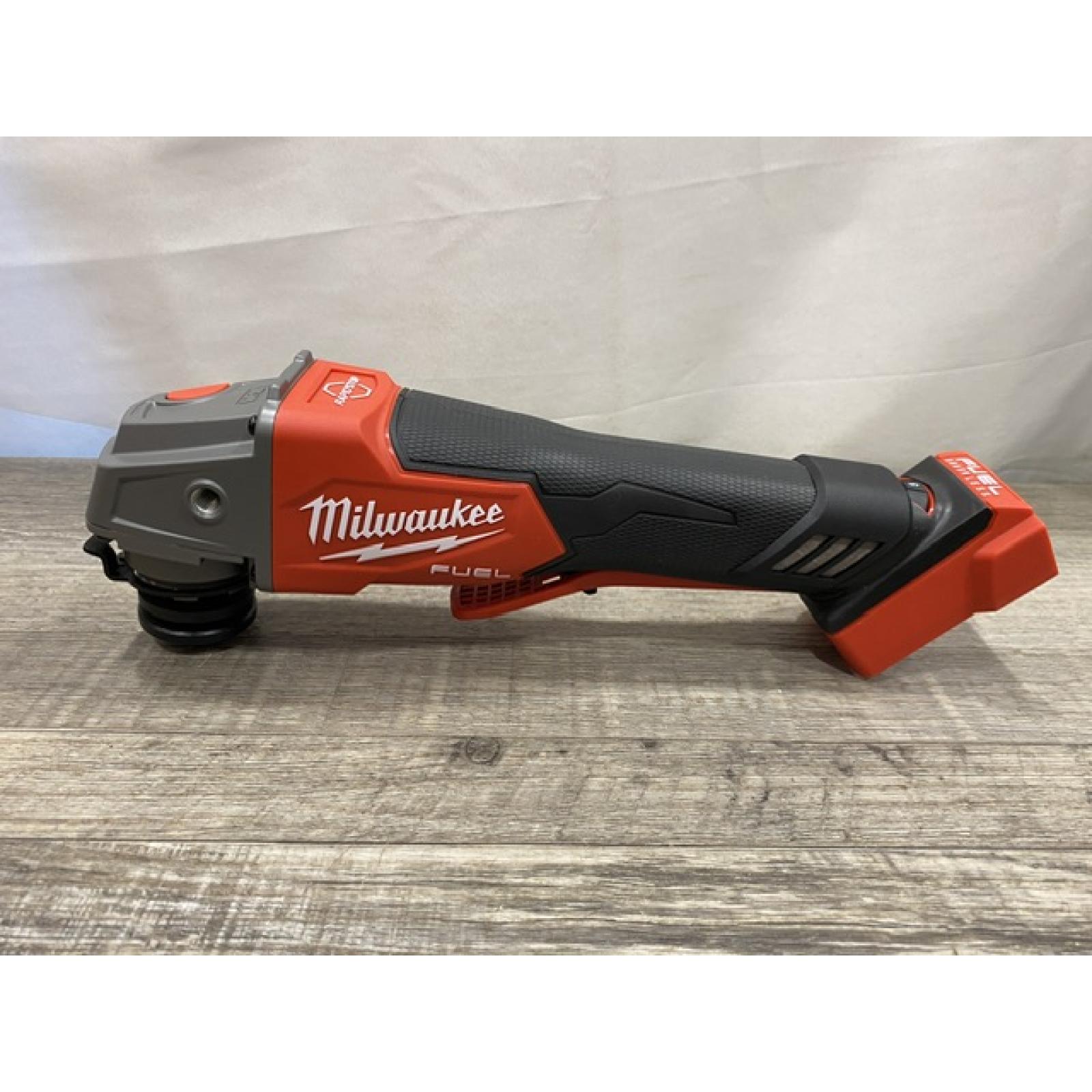 AS-IS Milwaukee FUEL 18V Lithium-Ion Brushless Cordless 4-1/2 in./5 in. Grinder with Variable Speed & Paddle Switch (Tool-Only)