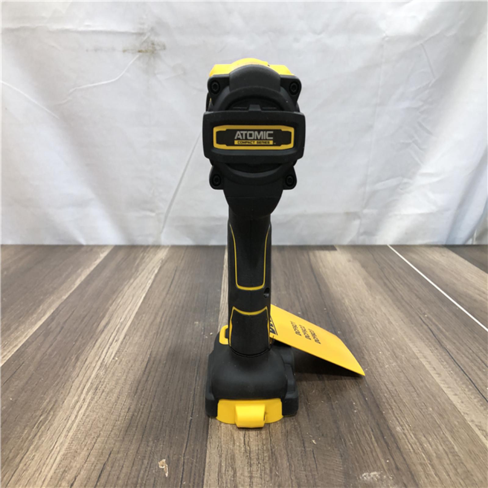 AS-IS DEWALT ATOMIC 20V MAX Cordless Brushless 1/2 in. Variable Speed Impact Wrench (Tool Only)