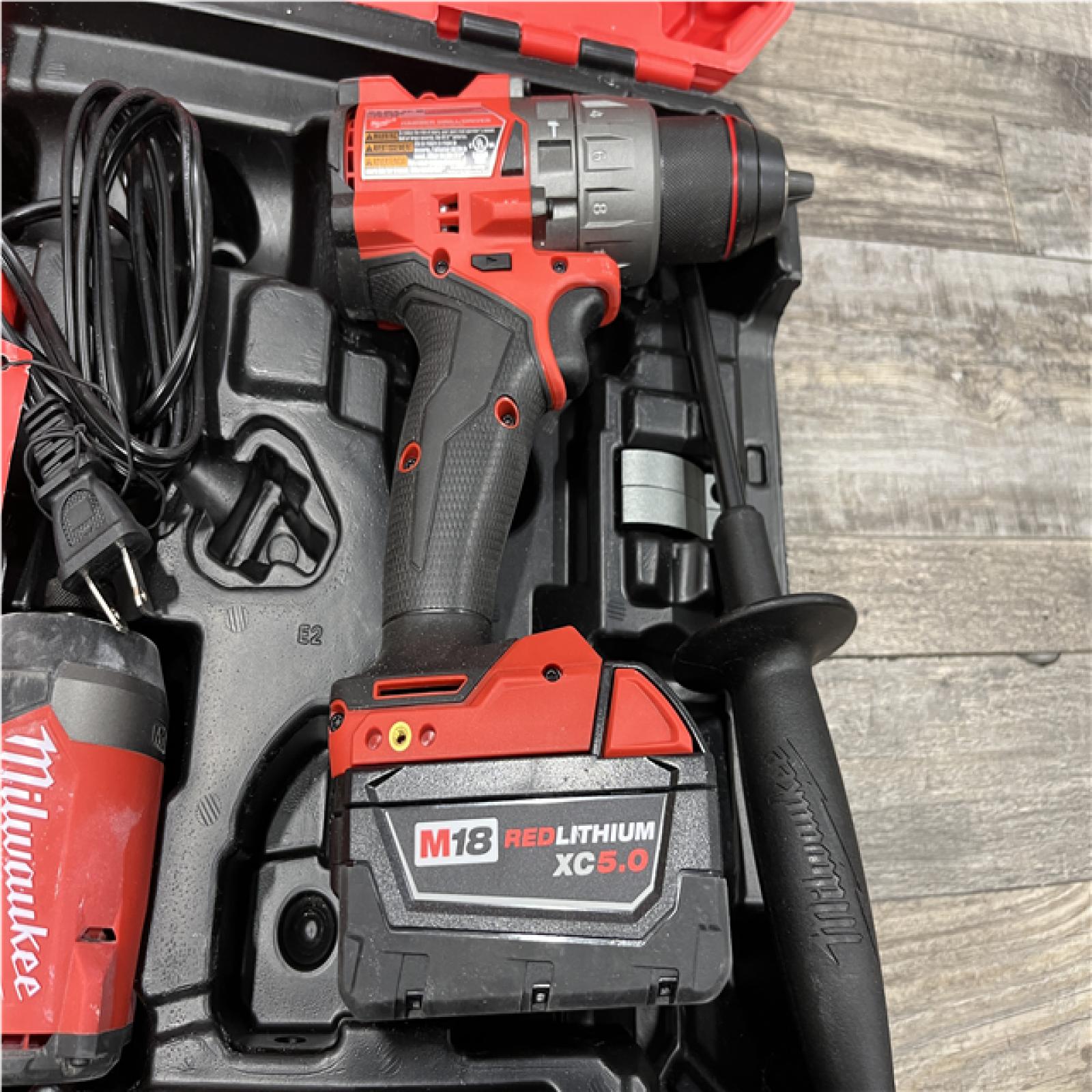 AS-IS Milwaukee FUEL 18V Lithium-Ion Brushless Cordless Hammer Drill and Impact Driver Combo Kit