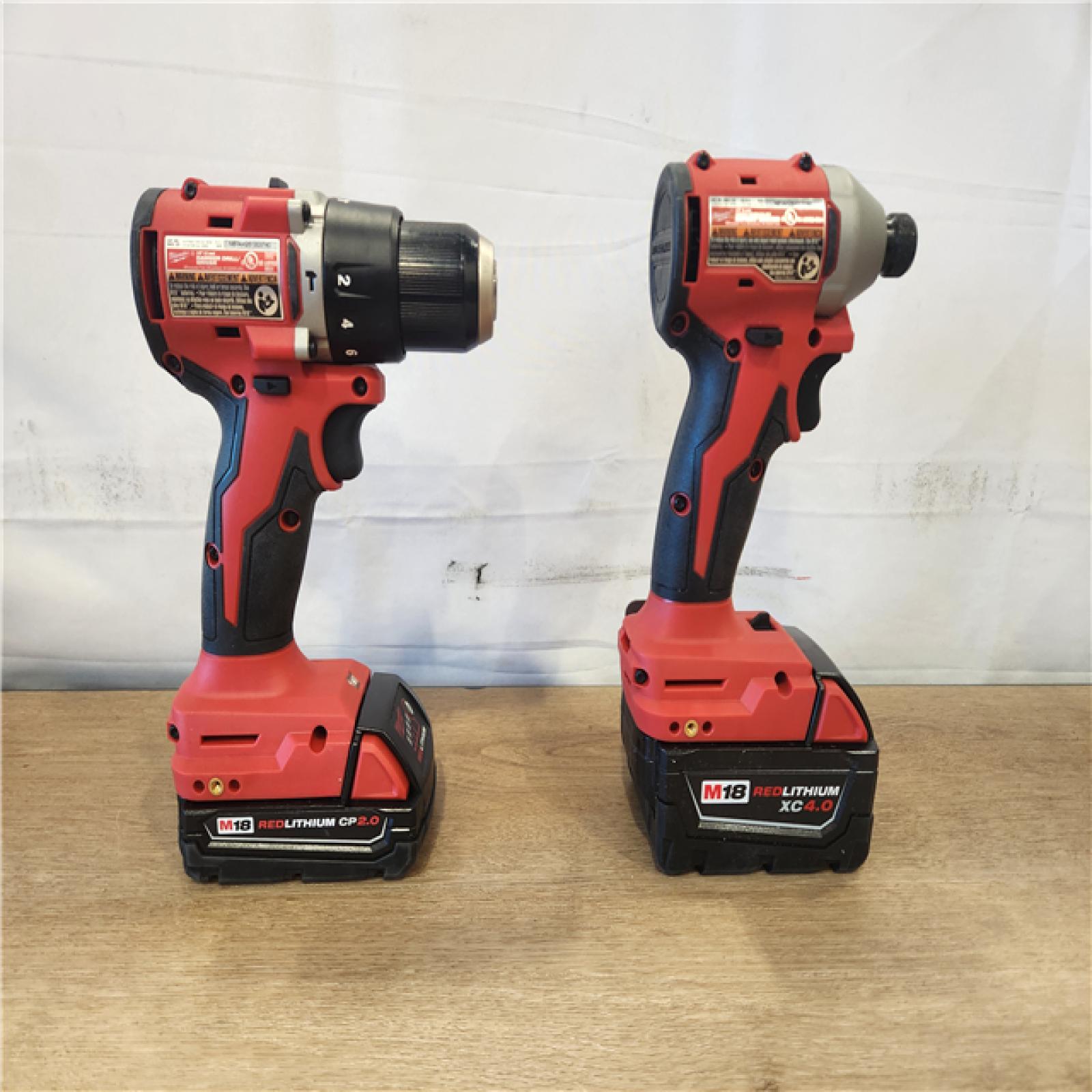 AS-IS- M18 18-Volt Lithium-Ion Brushless Cordless Compact Hammer Drill/Impact Combo Kit (2-Tool) with (2) Batteries  Bag