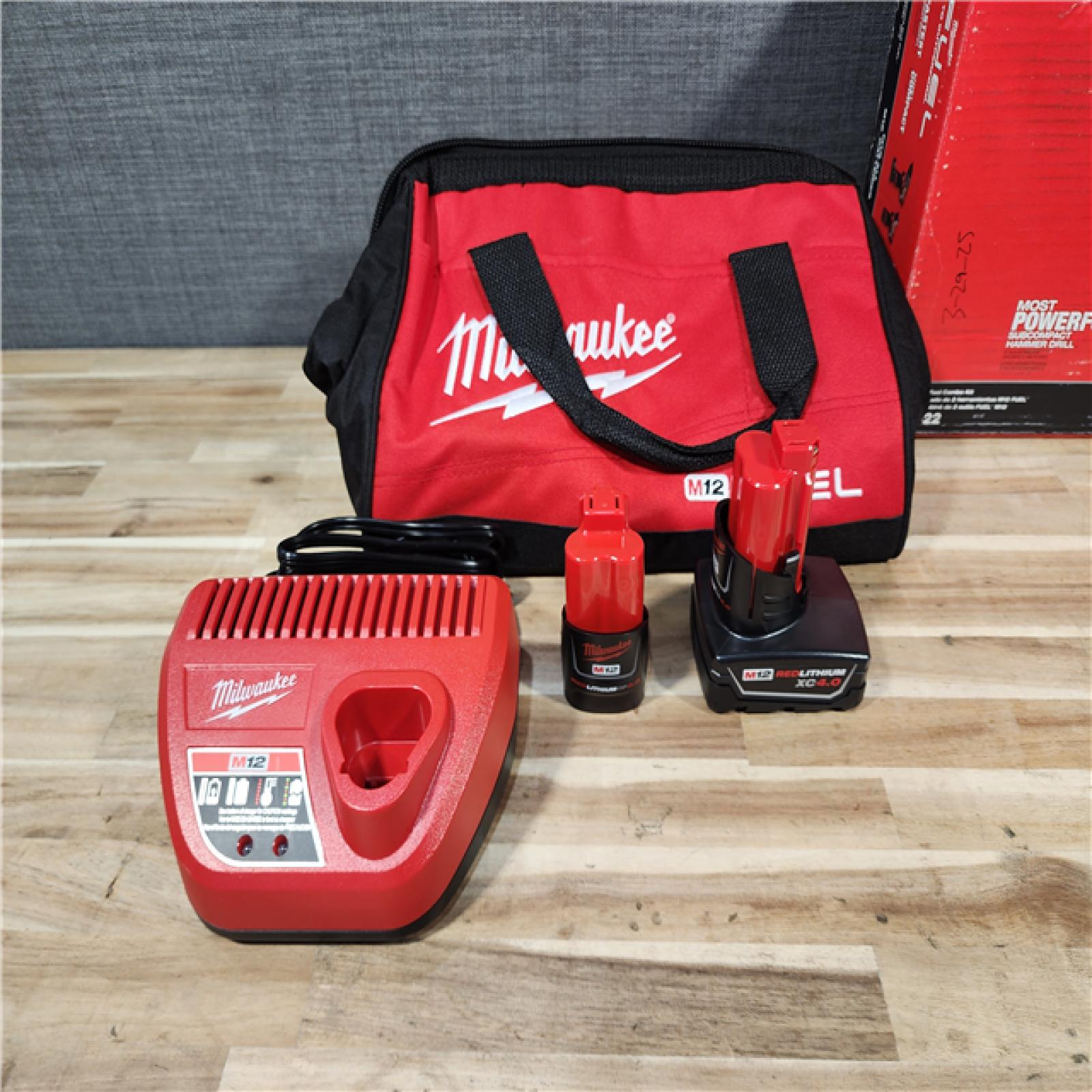 HOUSTON LOCATION - AS-IS (APPEARS LIKE NEW) Milwaukee FUEL 12-Volt Lithium-Ion Brushless Cordless Hammer Drill and Impact Driver Combo Kit