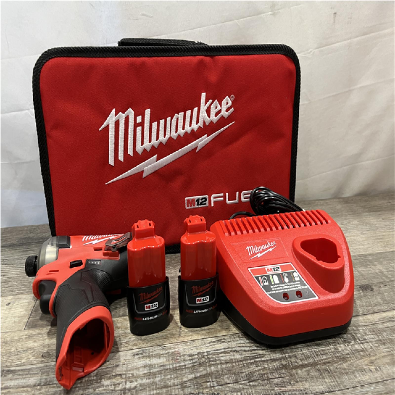 AS-IS Milwaukee FUEL SURGE 12V Lithium-Ion Brushless Cordless 1/4 in. Hex Impact Driver Compact Kit