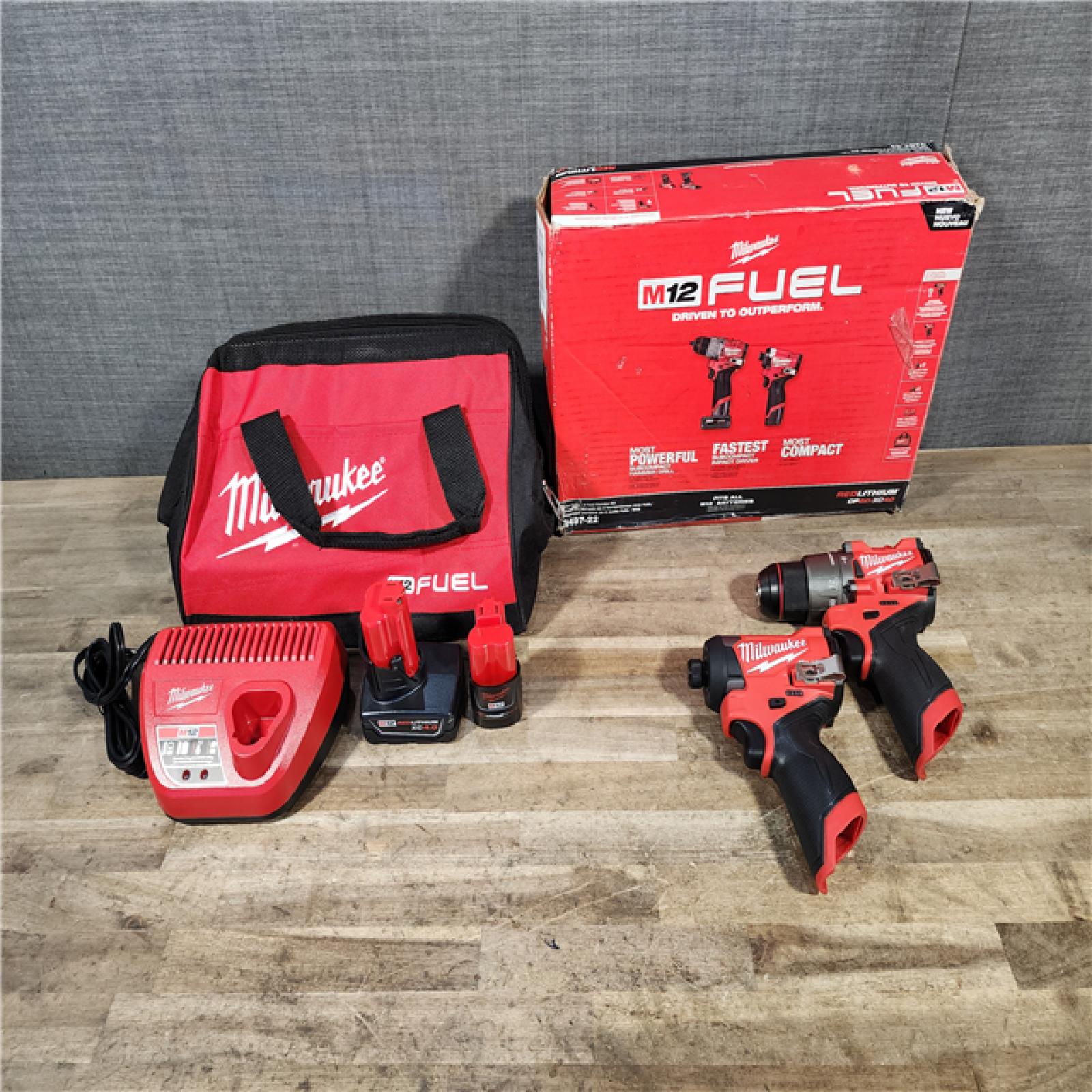 HOUSTON LOCATION - AS-IS Milwaukee FUEL 12-Volt Lithium-Ion Brushless Cordless Hammer Drill and Impact Driver Combo Kit