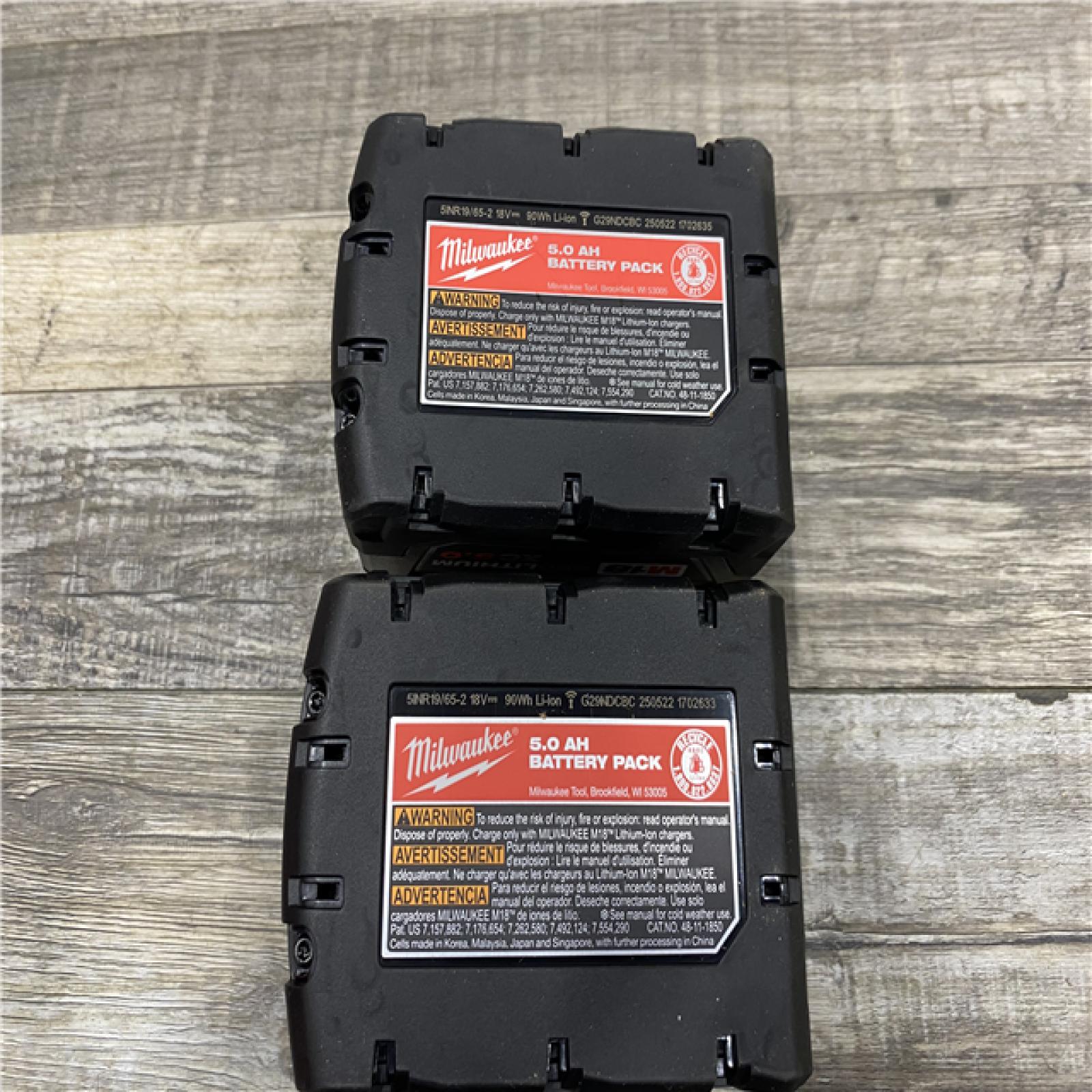 AS-IS Milwaukee 18-Volt Lithium-Ion XC Starter Kit with Two 5.0Ah Batteries and Charger