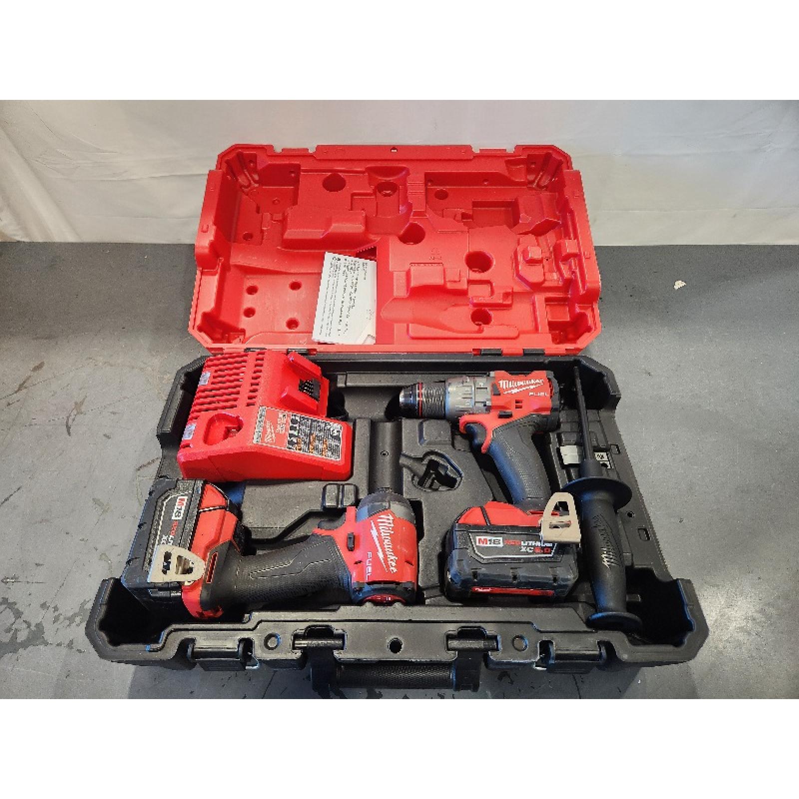 AS-IS- MILWAUKEE FUEL 18V Lithium-Ion Brushless Cordless Hammer Drill and Impact Driver Combo Kit