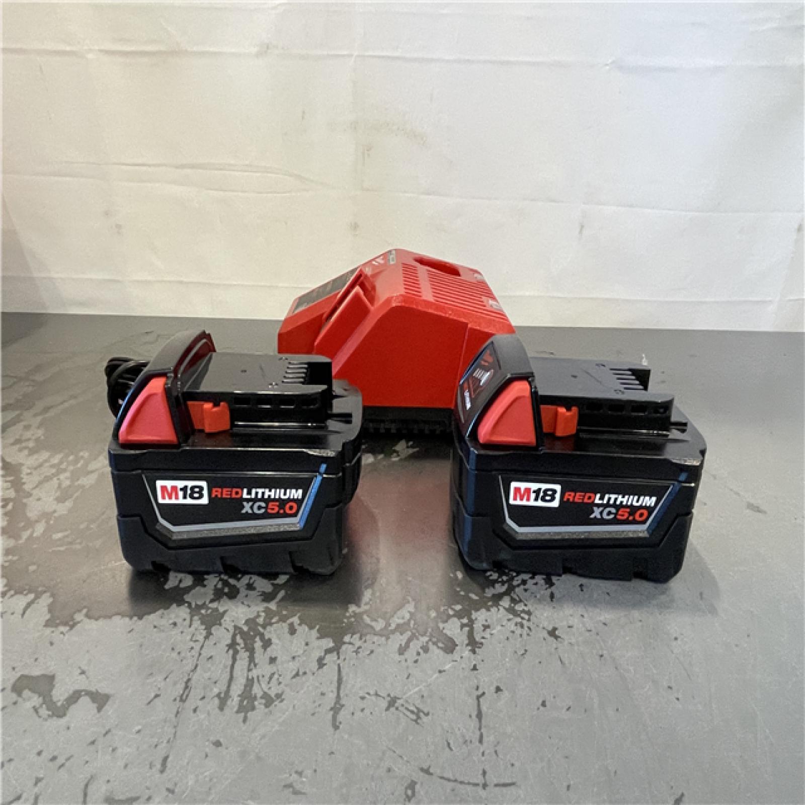 AS-IS- Milwaukee M18 18-Volt Lithium-Ion XC Starter Kit with Two 5.0Ah Batteries and Charger