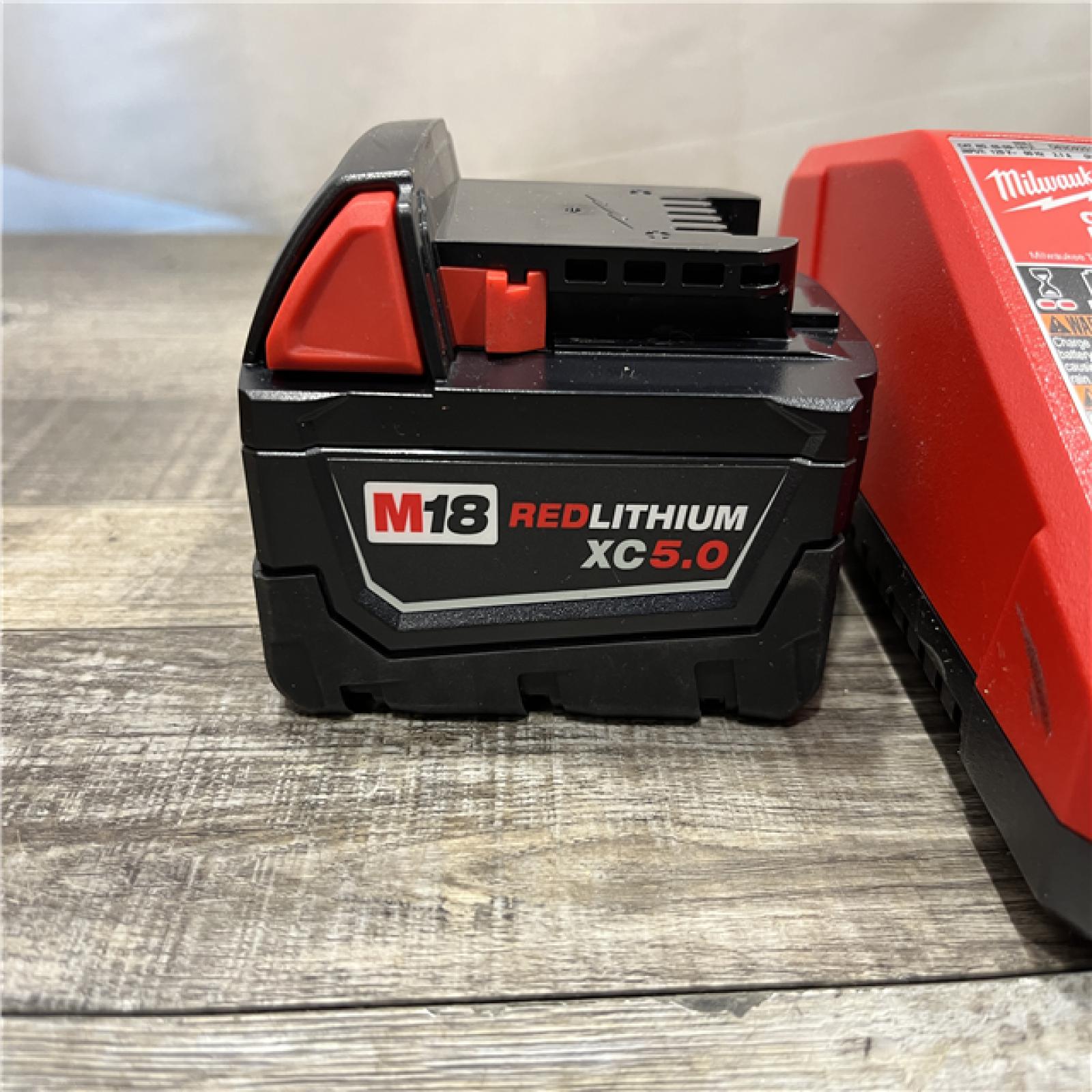 AS-IS Milwaukee 18-Volt Lithium-Ion XC Starter Kit with One 5.0Ah Battery and Charger