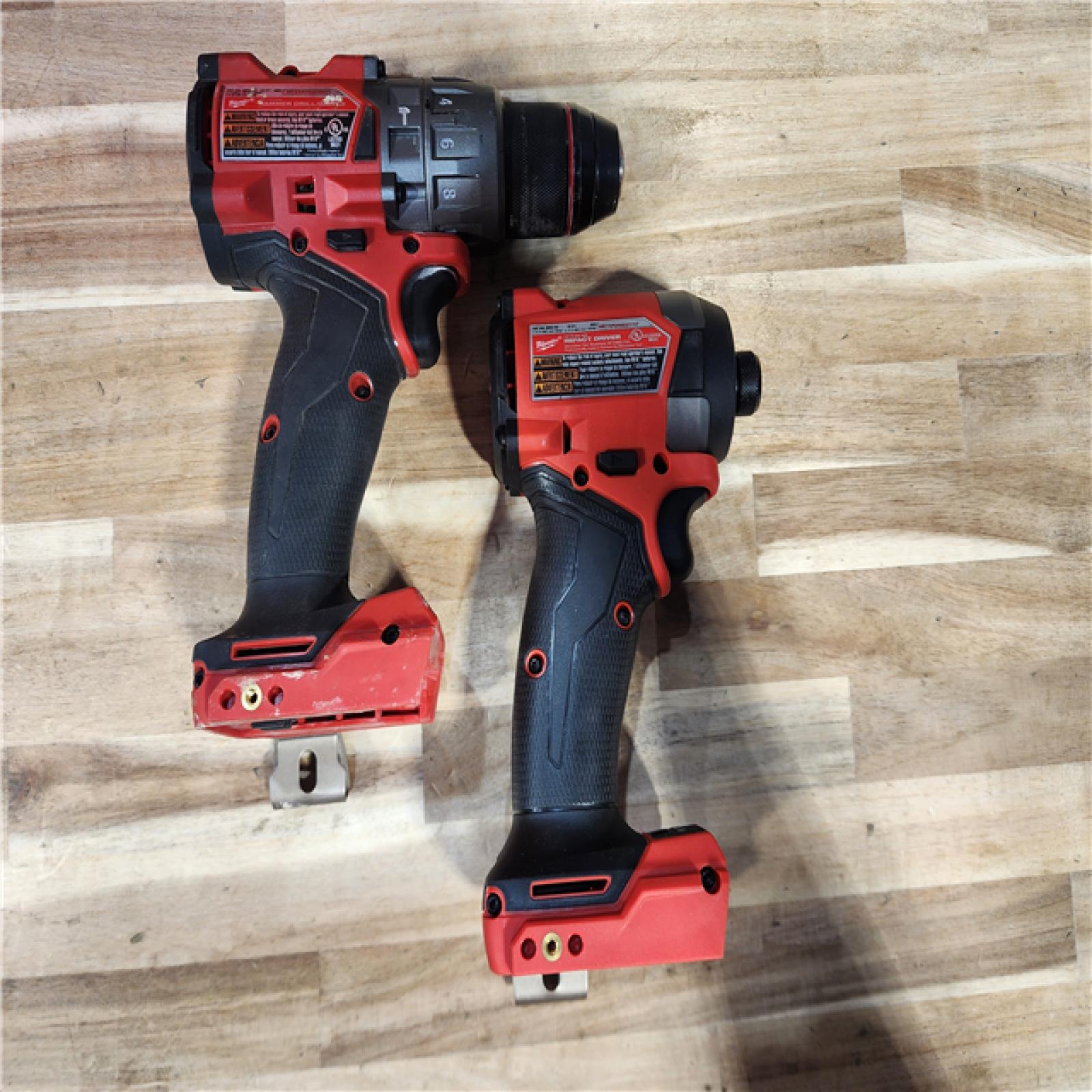 HOUSTON LOCATION - AS-IS Milwaukee FUEL 18V Lithium-Ion Brushless Cordless Hammer Drill and Impact Driver Combo Kit