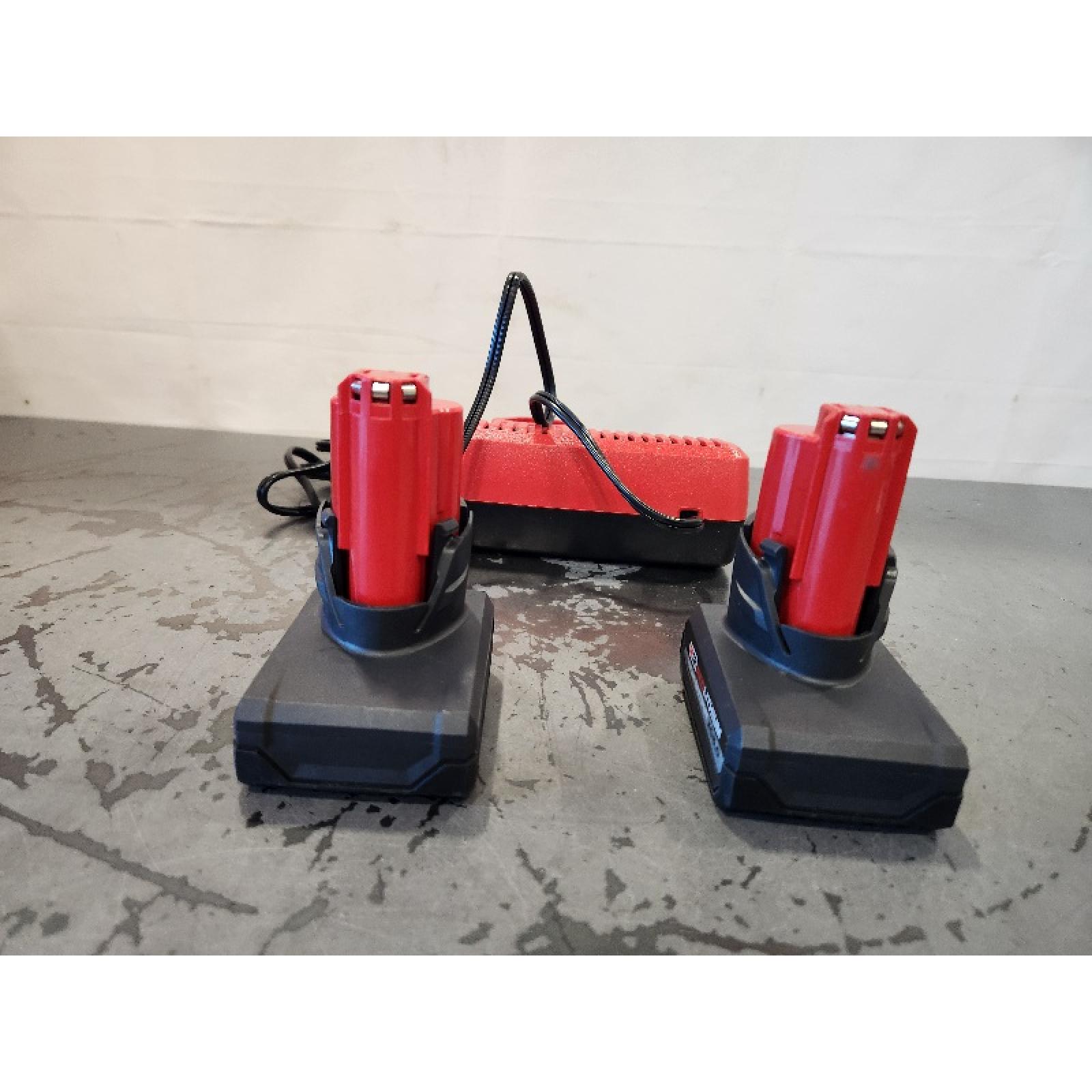 AS-IS- Milwaukee M12 12V Lithium-Ion XC High Output 5.0 Ah Battery Pack (2-Pack) Starter Kit with Charger