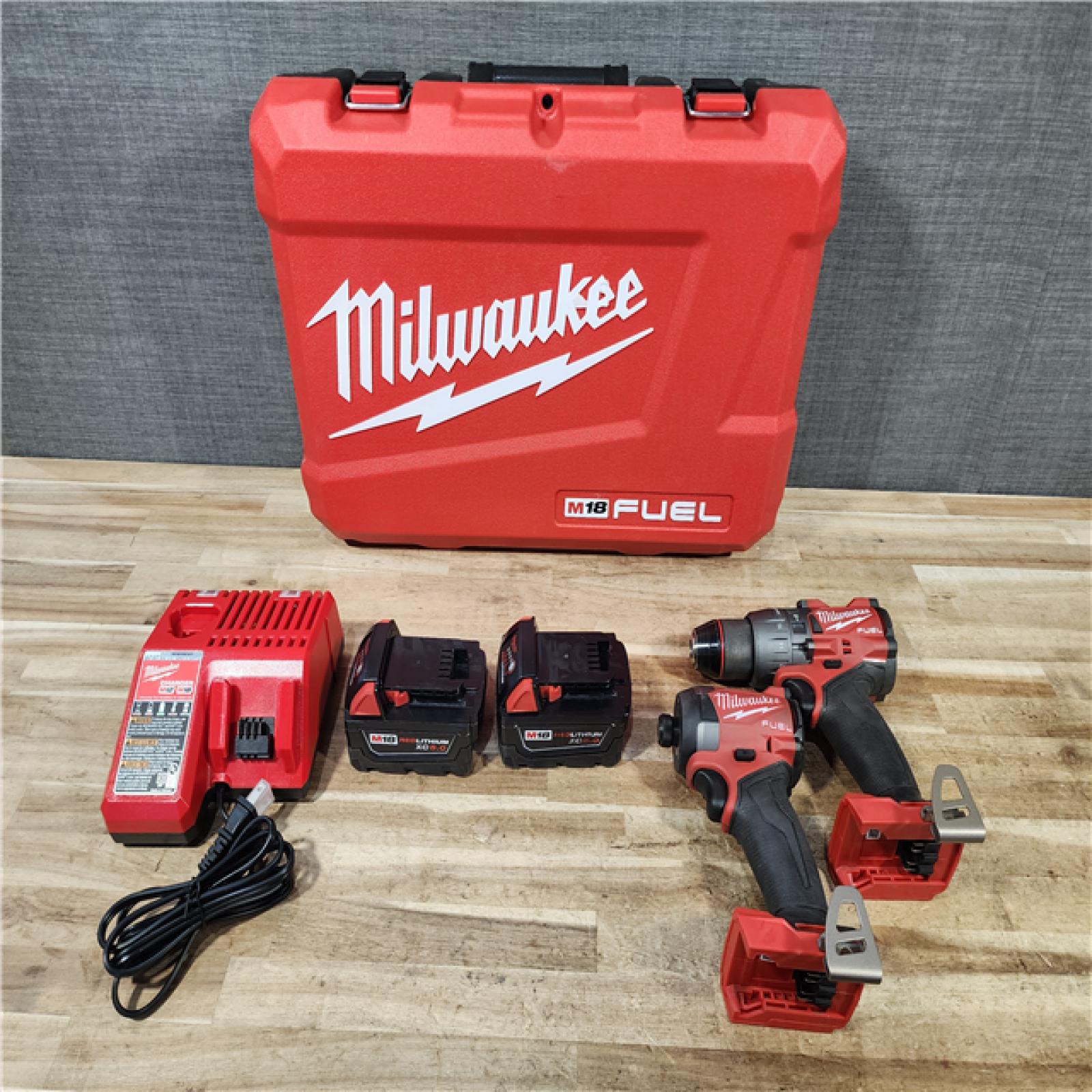 HOUSTON LOCATION - AS - IS Milwaukee FUEL 18V Lithium-Ion Brushless Cordless Hammer Drill and Impact Driver Combo Kit