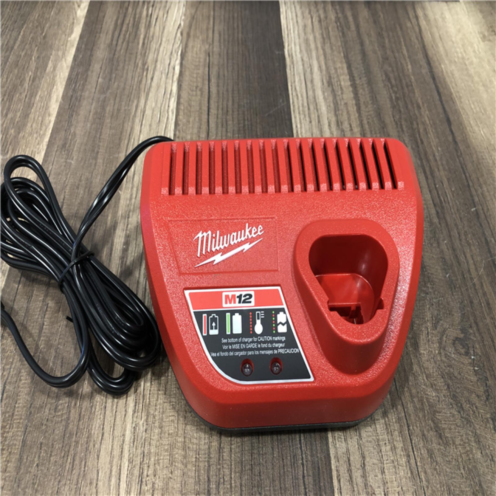 AS-IS Milwaukee 12-Volt Lithium-Ion XC High Output 5.0 Ah Battery Pack with Charger Starter Kit