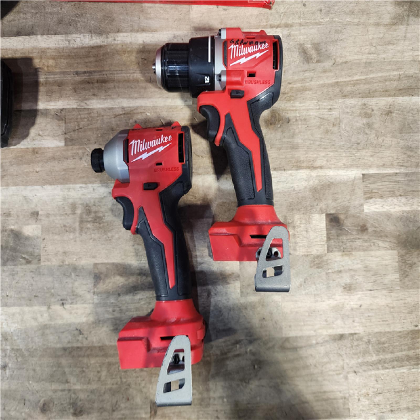 HOUSTON LOCATION - AS-IS Milwaukee M18 18V Lithium-Ion Brushless Cordless Compact Drill/Impact Combo Kit (2-Tool) W/(2) 2.0 Ah Batteries, Charger & Bag