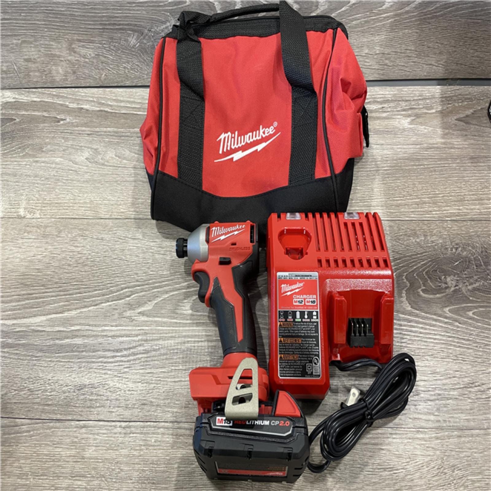 AS-IS Milwaukee 18-Volt Lithium-Ion Compact Brushless Cordless 1/4 in. Impact Driver Kit