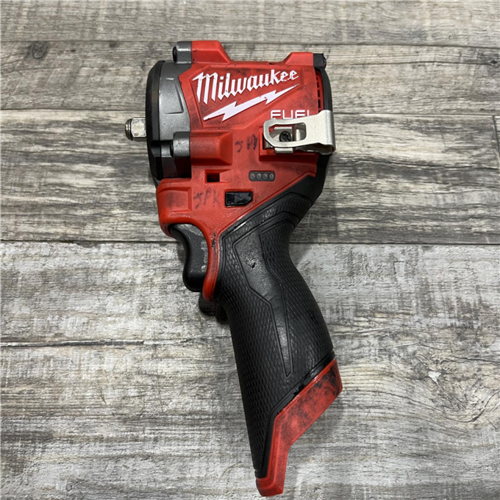 AS-IS Milwaukee FUEL 12V Lithium-Ion Brushless Cordless Stubby 3/8 in. Impact Wrench (Tool-Only)