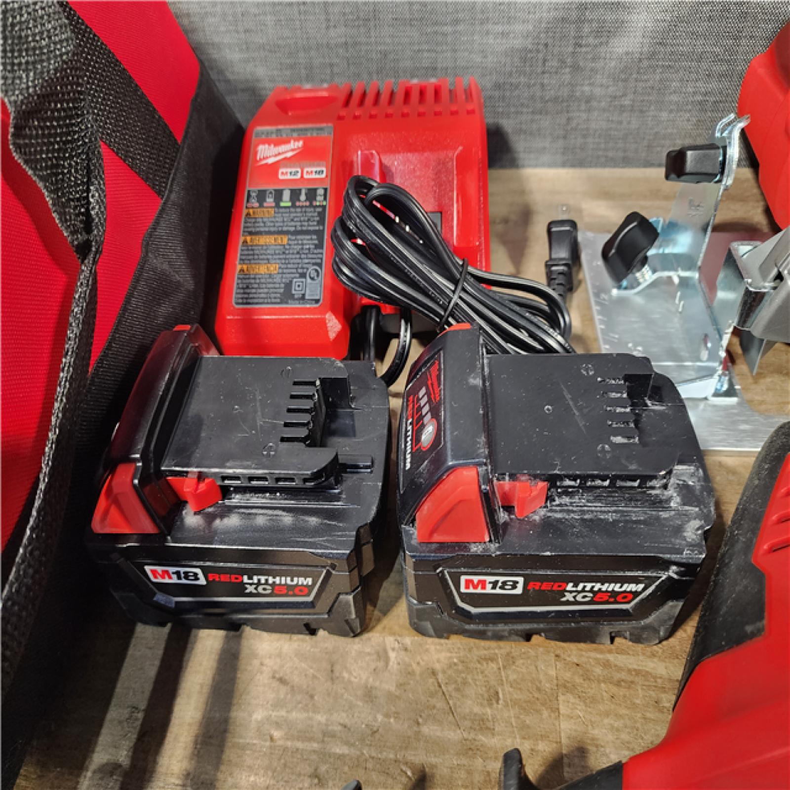 HOUSTON LOCATION - AS-IS Milwaukee M18 18-Volt Lithium-Ion Cordless Combo Kit (9-Tool) with (2) Batteries  Charger  and Tool Bag