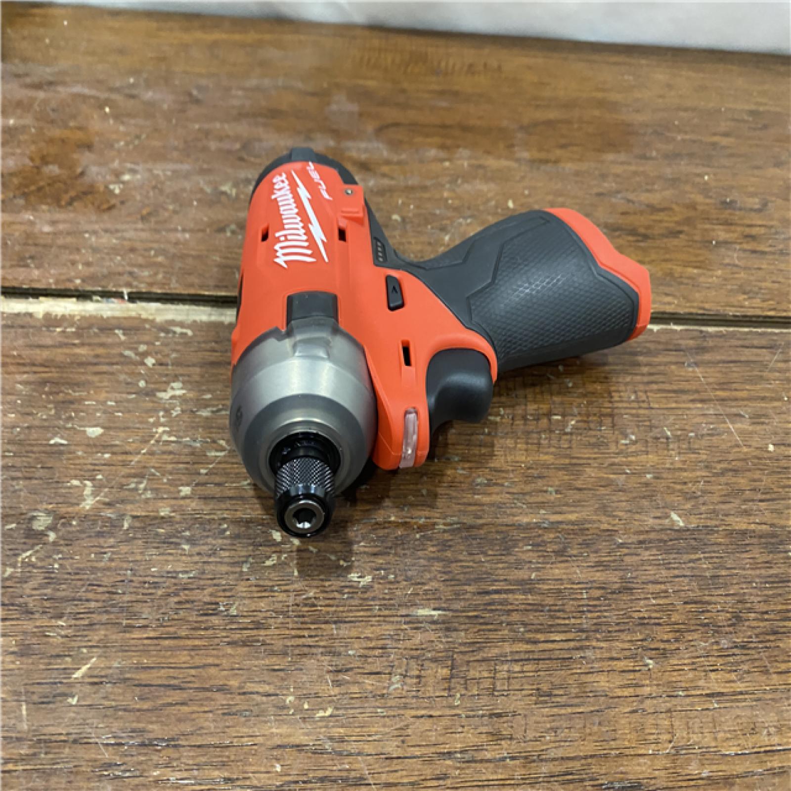 AS-IS M12 FUEL SURGE 12V Lithium-Ion Brushless Cordless 1/4 in. Hex Impact Driver Compact Kit W/Two 2.0Ah Batteries, Bag