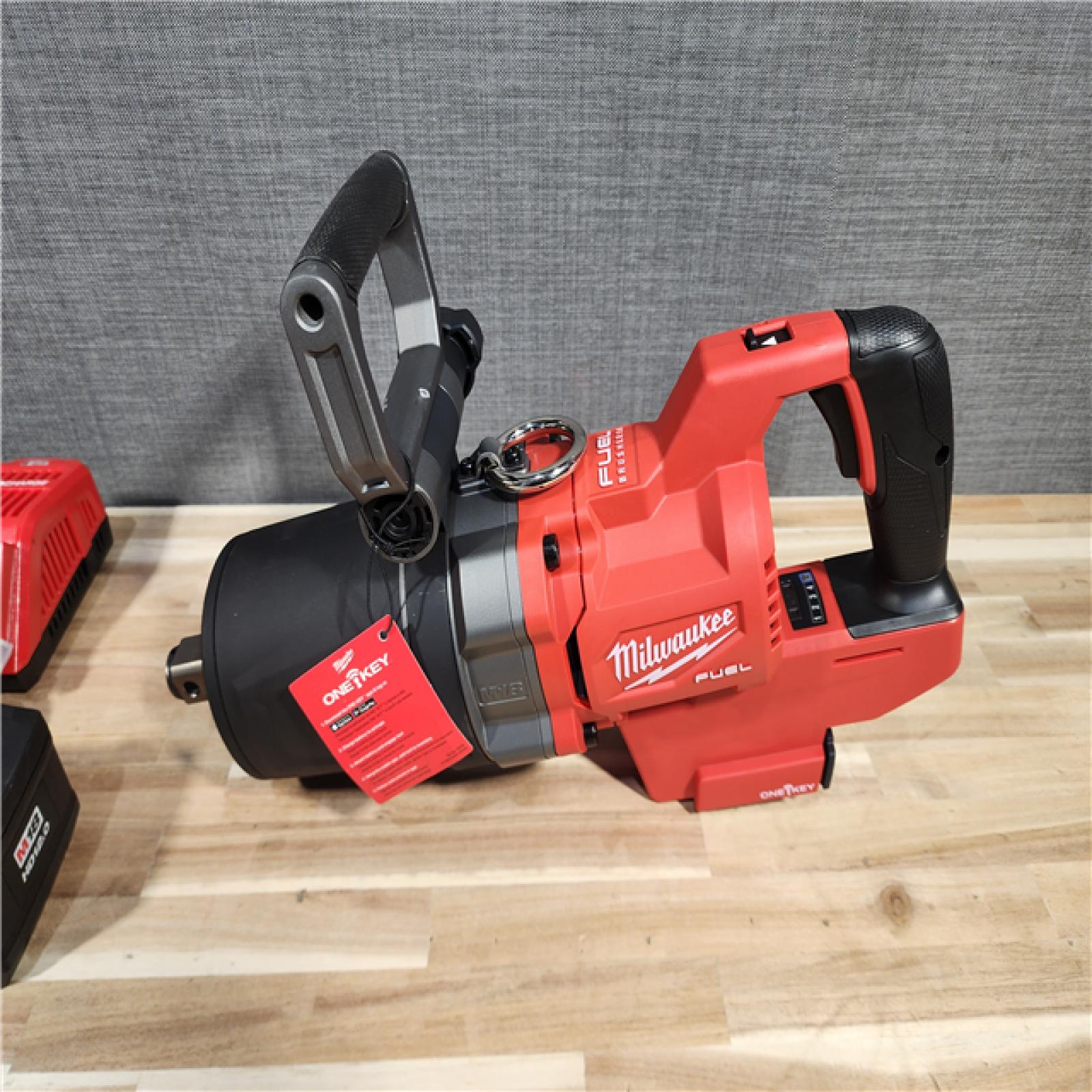 HOUSTON LOCATION - AS-IS (APPEARS LIKE NEW) Milwaukee M18 FUEL 18V Lithium-Ion Brushless Cordless 1 in. Impact Wrench with D-Handle Kit with (2) 12.0 Ah FORGE Batteries