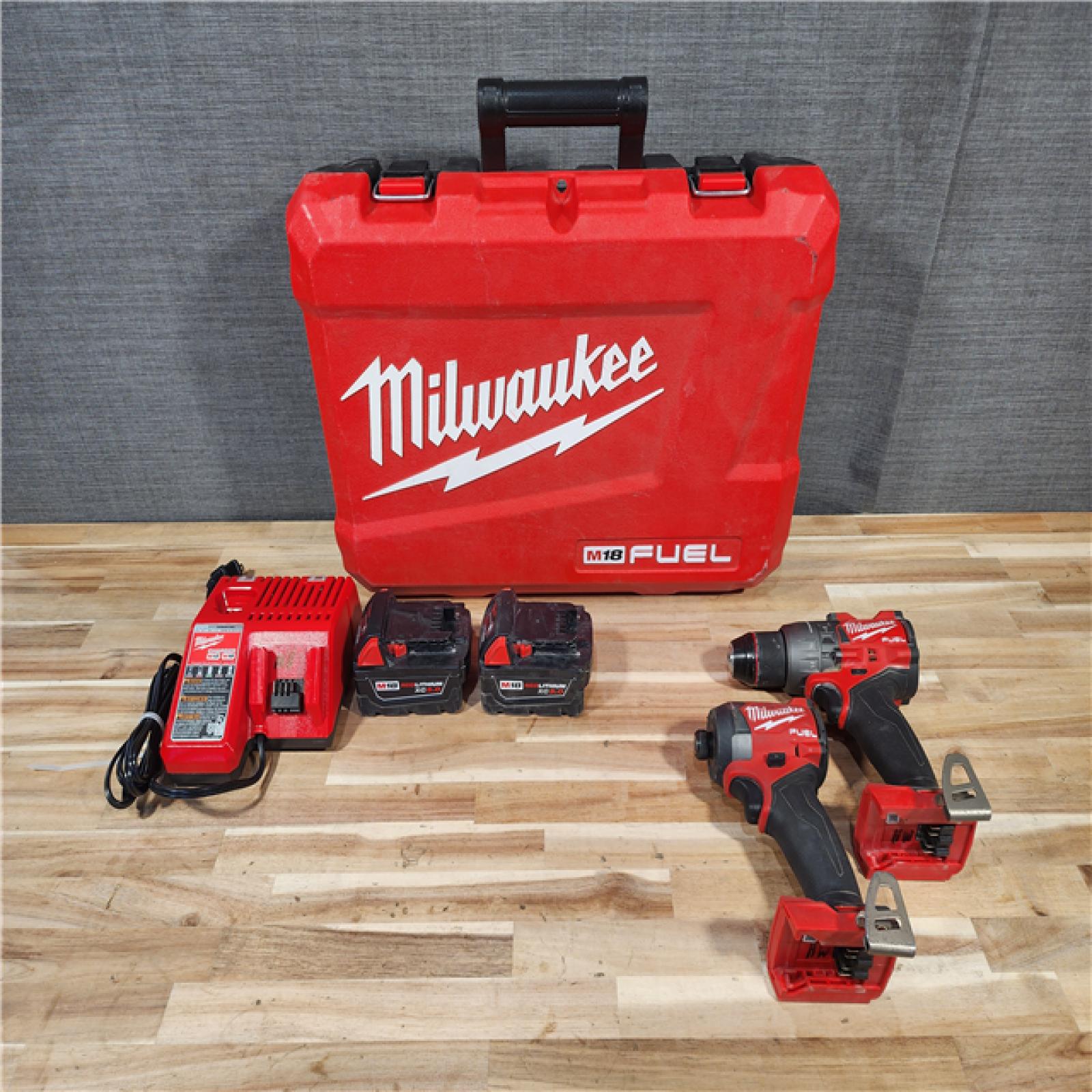 HOUSTON LOCATION - AS-IS Milwaukee  FUEL 18V Lithium-Ion Brushless Cordless Hammer Drill and Impact Driver Combo Kit