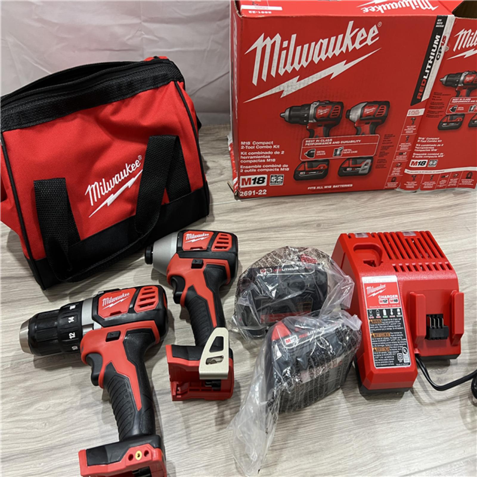AS-IS Milwaukee M18 18V Lithium-Ion Cordless Drill Driver/Impact Driver Combo Kit