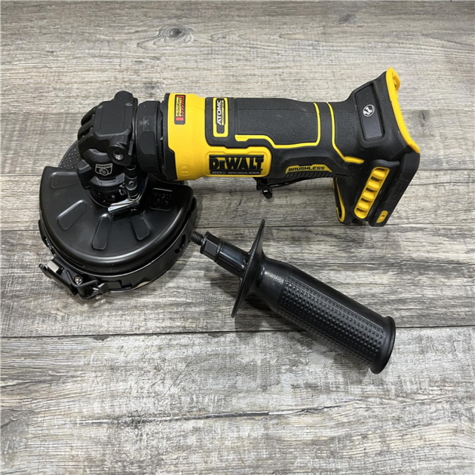 AS-IS DEWALT ATOMIC 20V MAX Cordless 4-1/2 in. Angle Grinder with Paddle Switch (Tool Only)