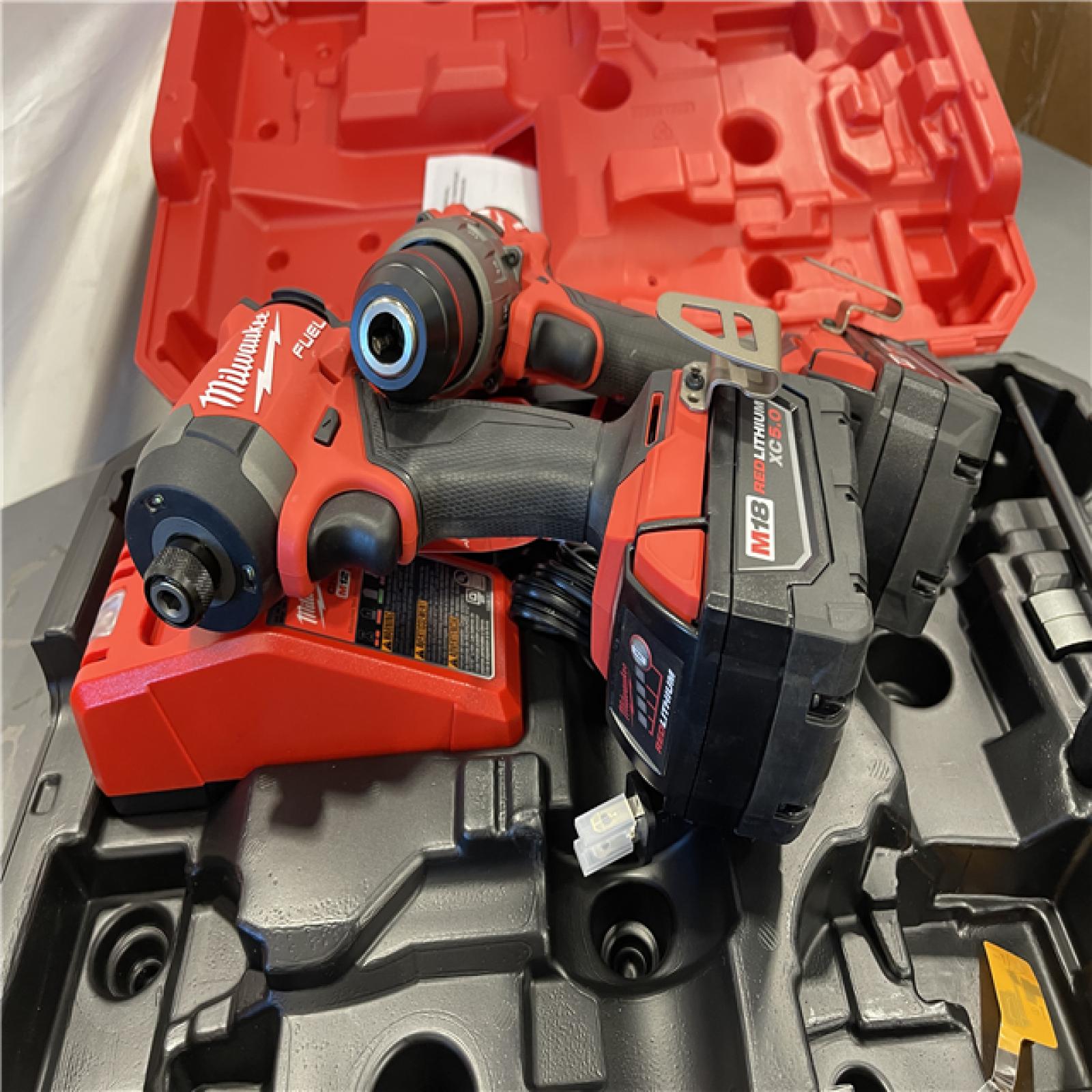 AS-IS - MILWAUKEE FUEL 18V Lithium-Ion Brushless Cordless Hammer Drill and Impact Driver Combo Kit