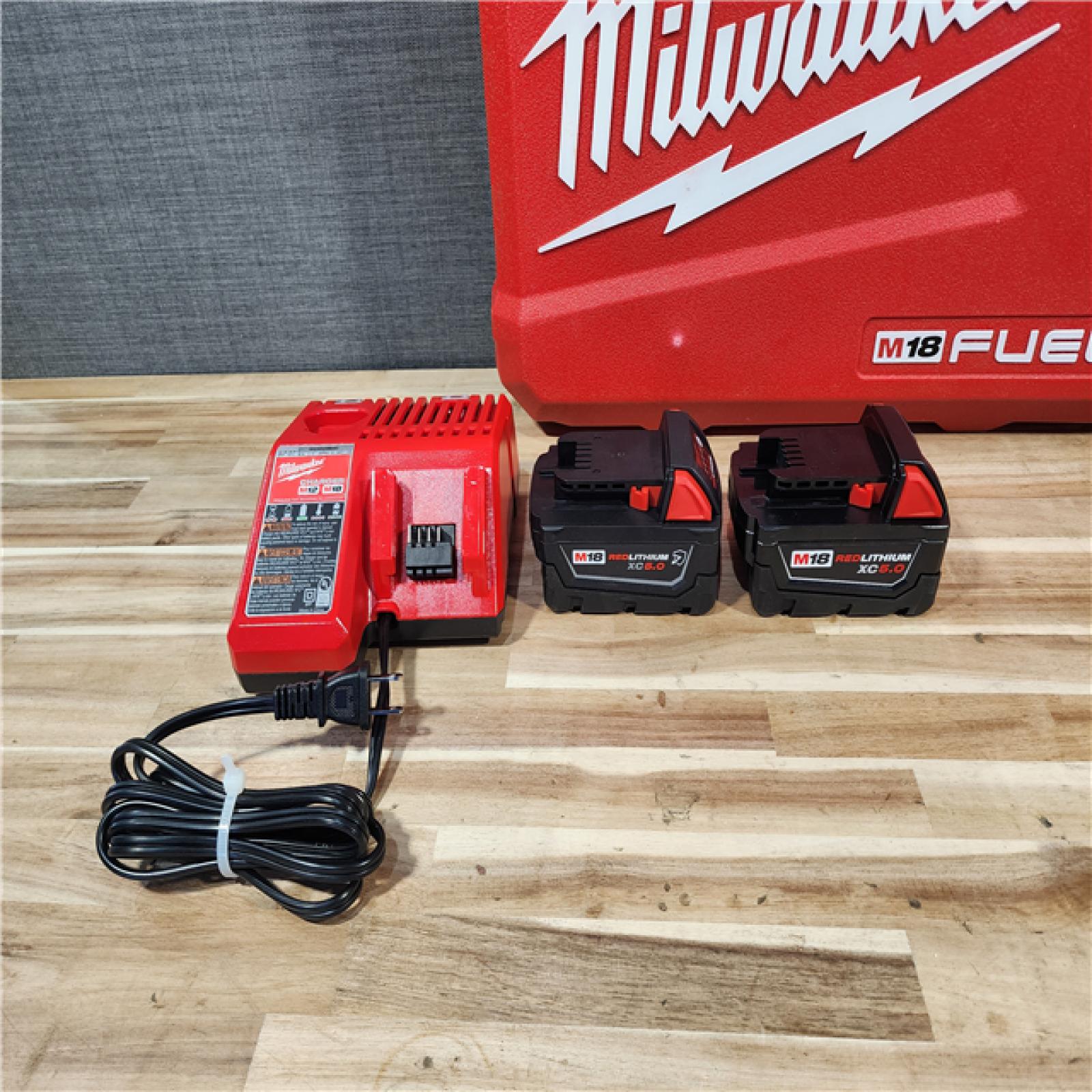 HOUSTON LOCATION - AS-IS Milwaukee  FUEL 18V Lithium-Ion Brushless Cordless Hammer Drill and Impact Driver Combo Kit