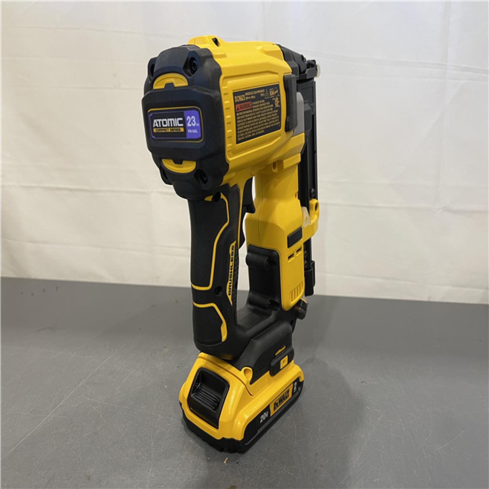 AS-IS - DeWalt ATOMIC 20V MAX Lithium Ion Cordless 23 Gauge Pin Nailer Kit