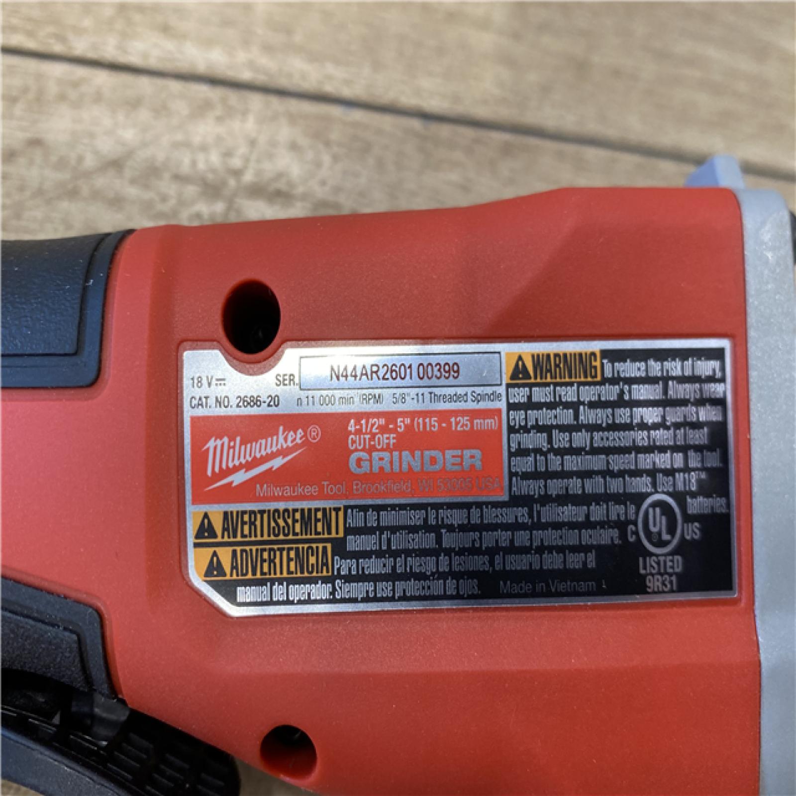 AS-IS Milwaukee 18V Lithium-Ion Brushless Cordless 4-1/2 in./5 in. Grinder w/Paddle Switch (Tool-Only)