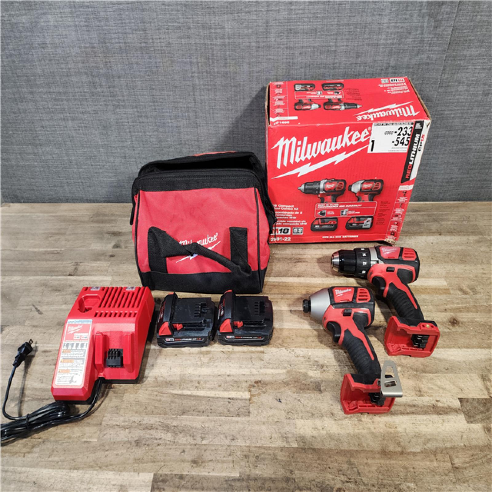HOUSTON LOCATION - AS-IS Milwaukee M18 Brushed Cordless (2-Tool) Drill/Driver and Impact Driver Kit