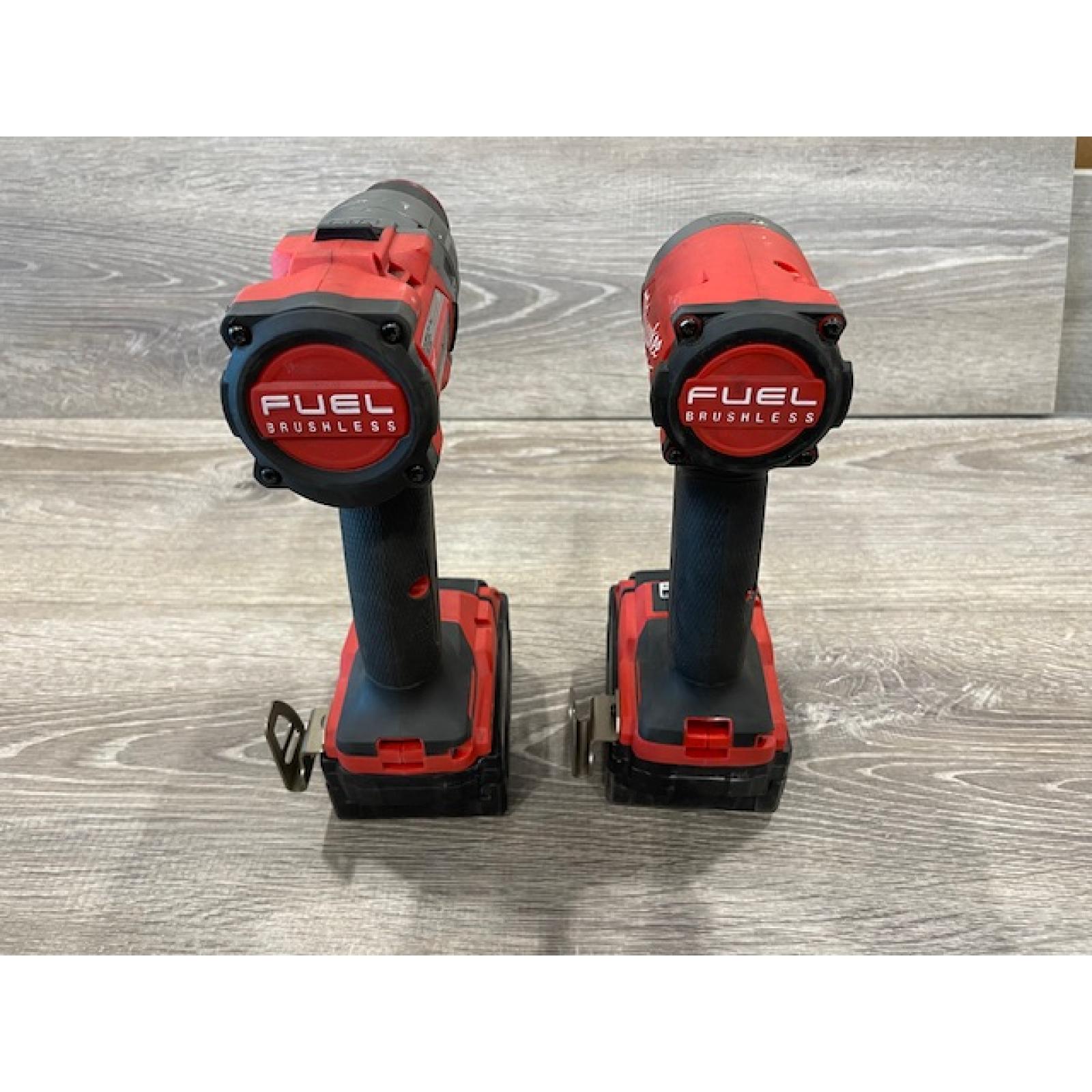 AS-IS Milwaukee FUEL 18V Lithium-Ion Brushless Cordless Hammer Drill and Impact Driver Combo Kit