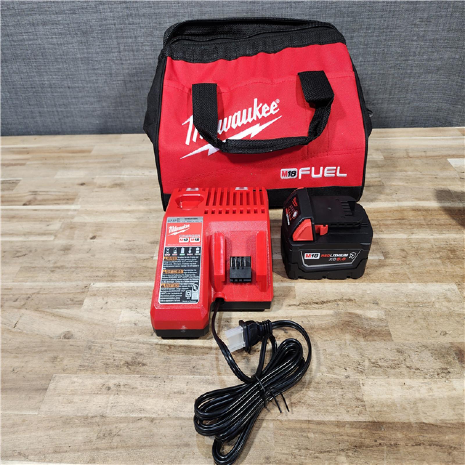 HOUSTON LOCATION - AS-IS (APPEARS LIKE NEW) Milwaukee FUEL 18V Lithium-Ion Brushless Cordless 1/2 in. Impact Wrench w/Friction Ring Kit