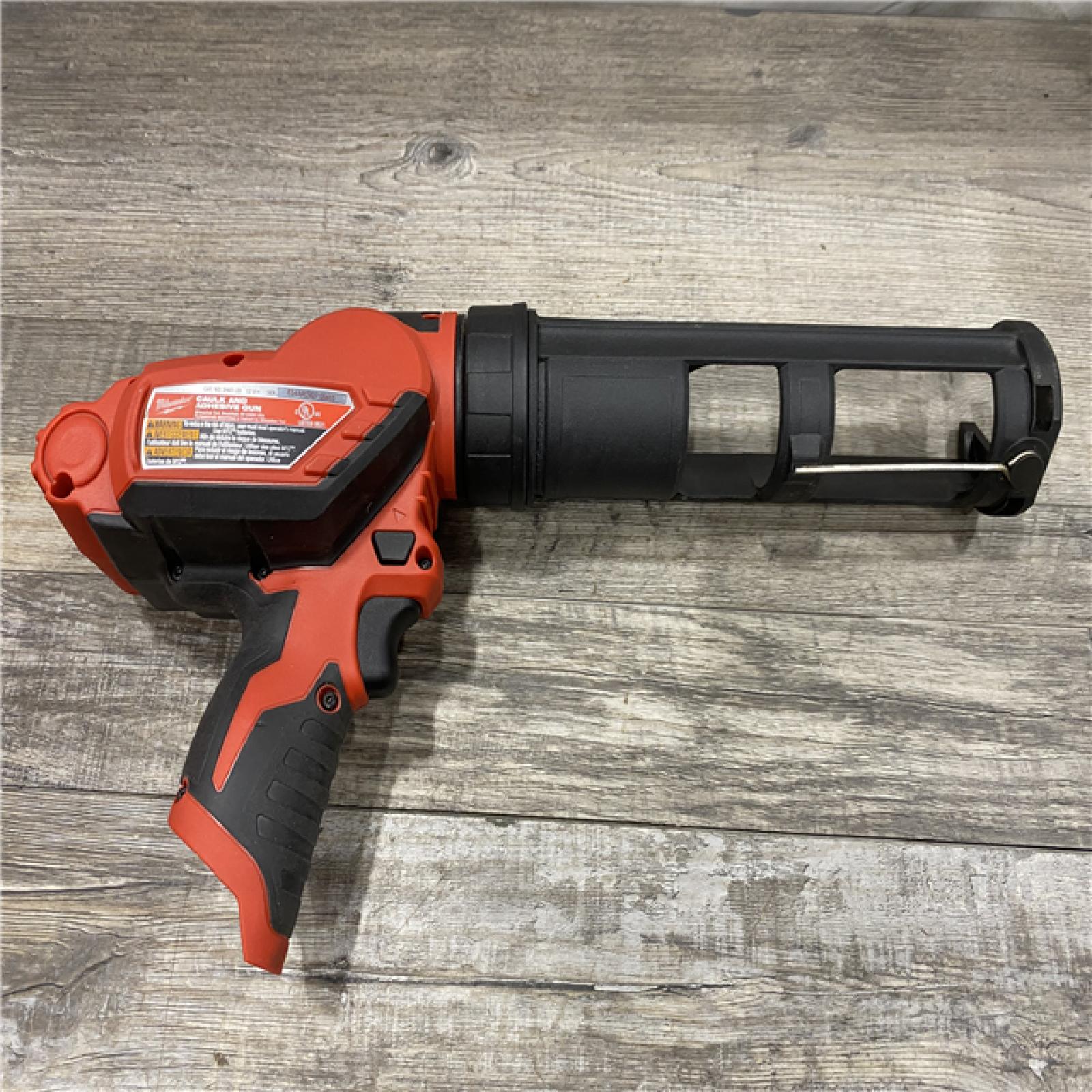 AS-IS Milwaukee 12V Lithium-Ion Cordless 10 oz. Adhesive and Caulk Gun (Tool-Only)