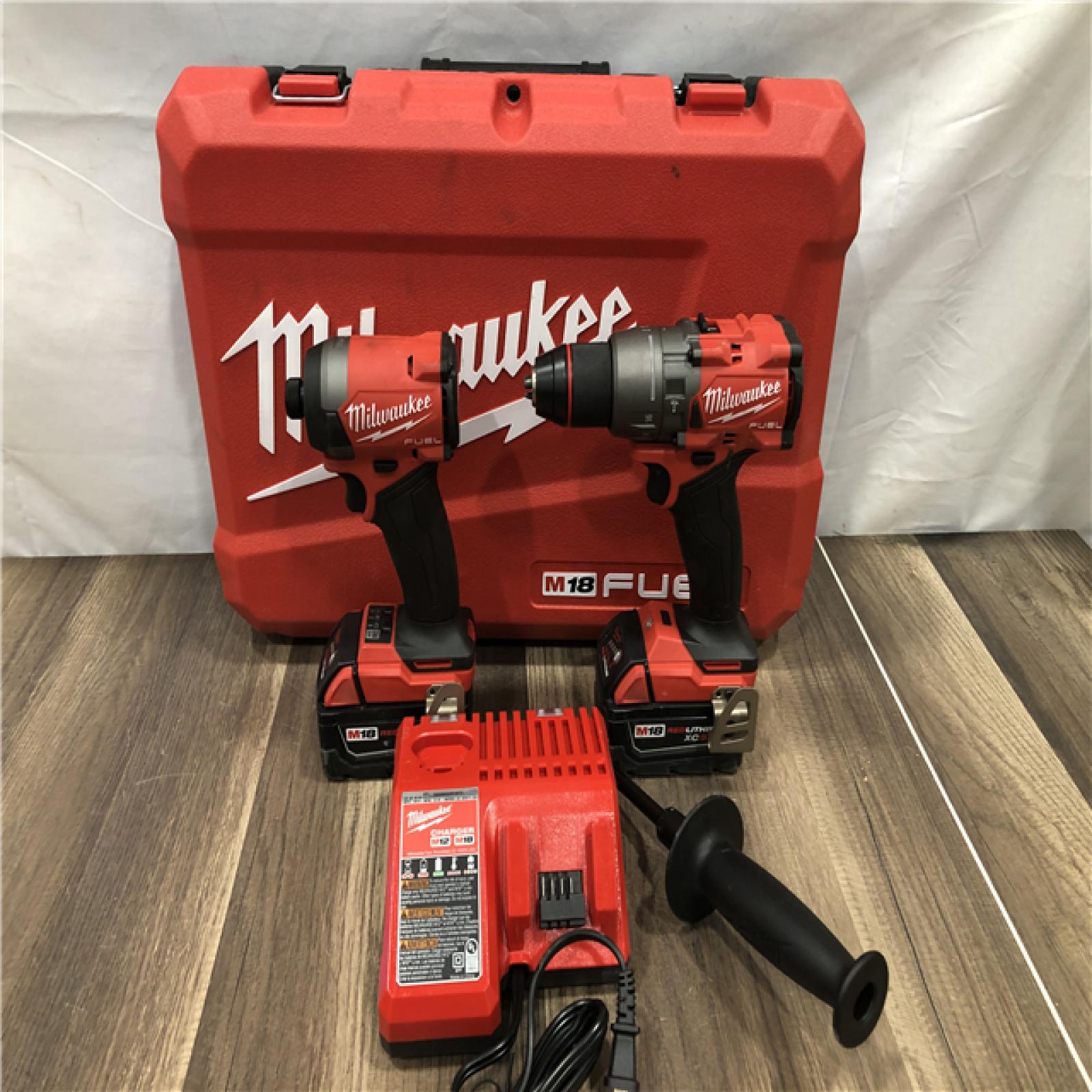 AS-IS Milwaukee FUEL 18V Lithium-Ion Brushless Cordless Hammer Drill and Impact Driver Combo Kit