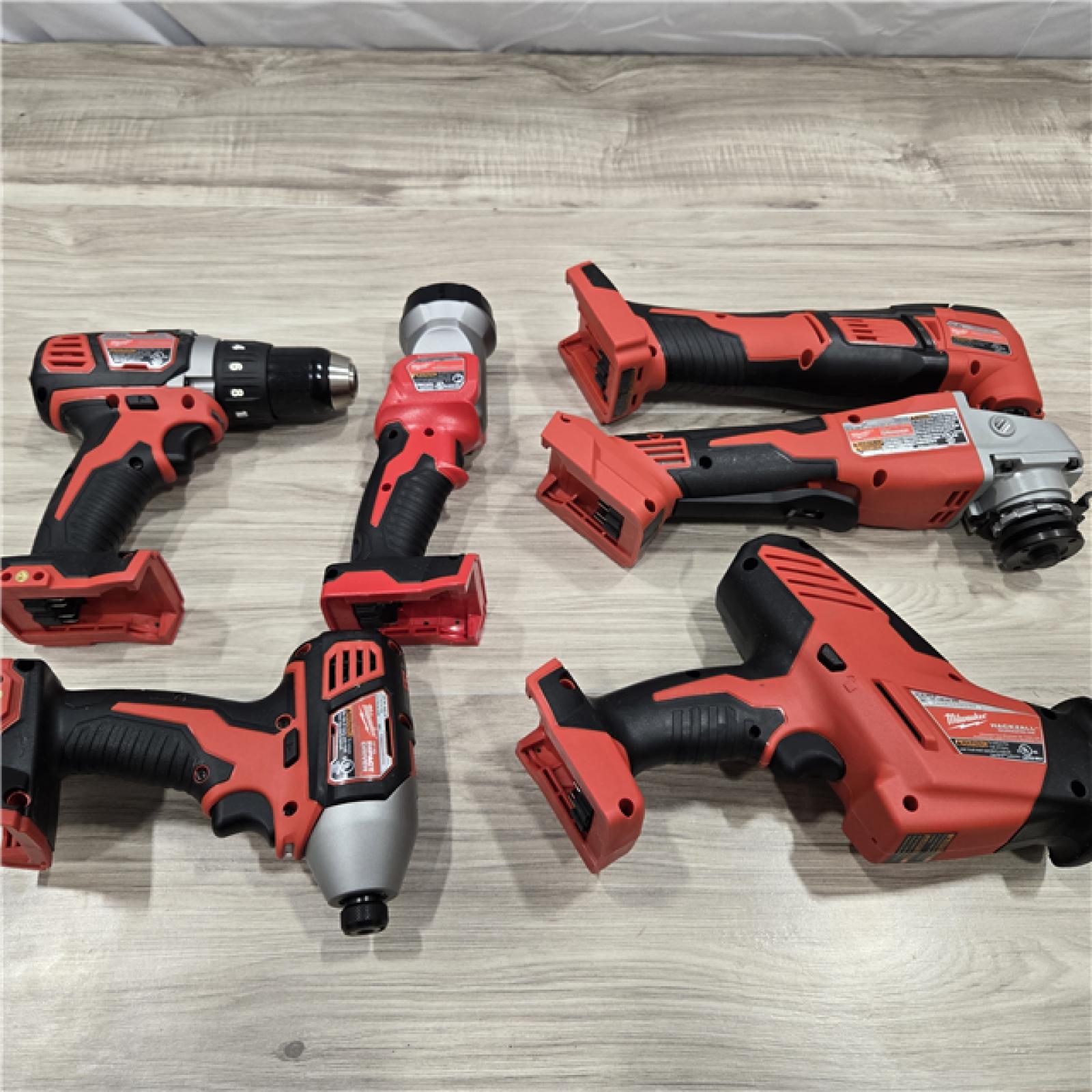 LIKE NEW! - Milwaukee M18 18-Volt Lithium-Ion Cordless Combo Kit 7-Tool with 2-Batteries, Charger and Tool Bag