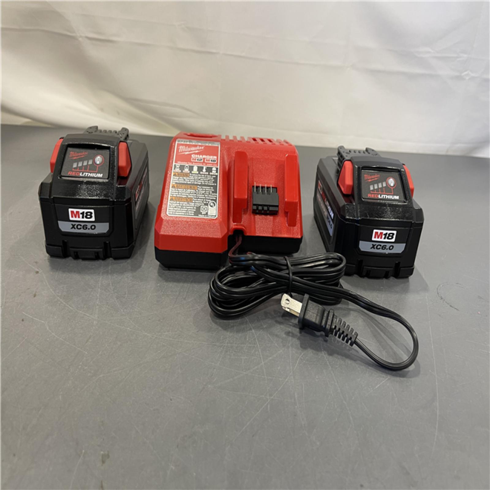 AS-IS - Milwaukee 18-Volt Lithium-Ion High Output Starter Kit with Two 6.0 Ah Battery and Charger